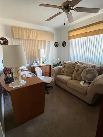 a kitchen with stainless steel appliances a stove a refrigerator and cabinets