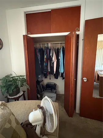 a kitchen with stainless steel appliances granite countertop a refrigerator stove and sink