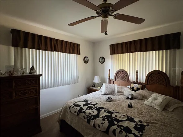 a kitchen with stainless steel appliances a sink stove and refrigerator