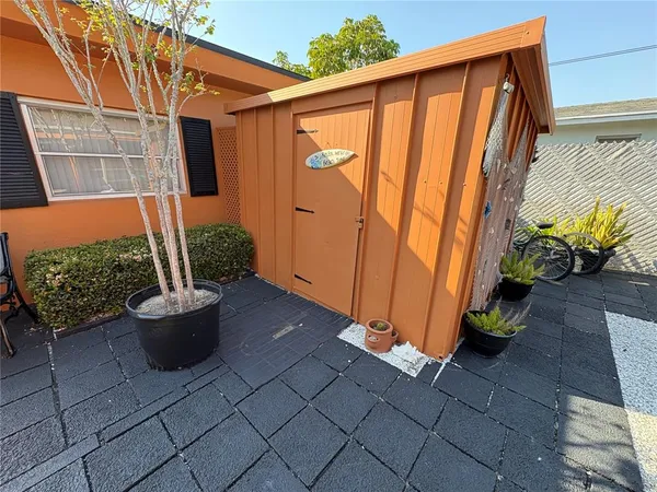 a backyard of a house with seating space
