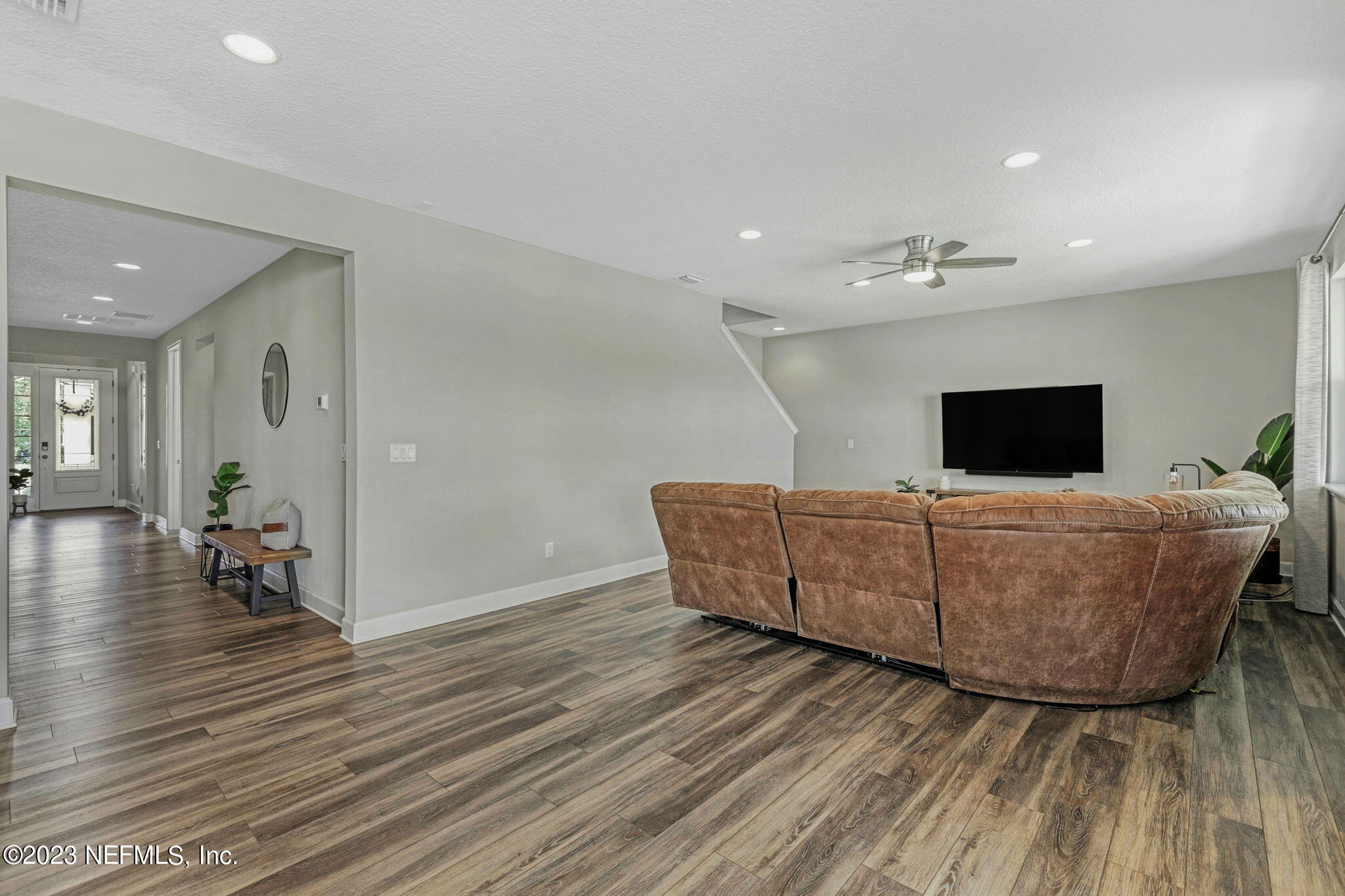 69 Willow Lake Drive St. Augustine, FL 32092 - Photo 11 of 42 a living room with furniture and a wooden floor