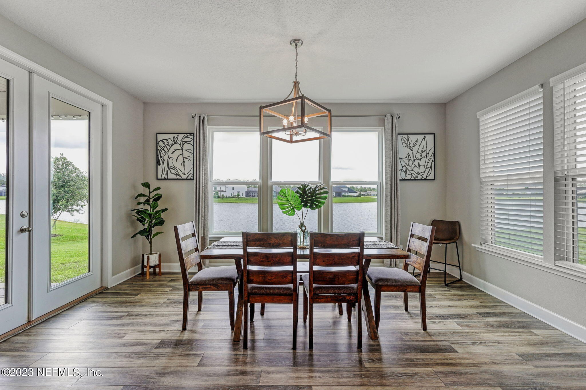 69 Willow Lake Drive St. Augustine, FL 32092 - Photo 12 of 42 a dining room with furniture window wooden floor