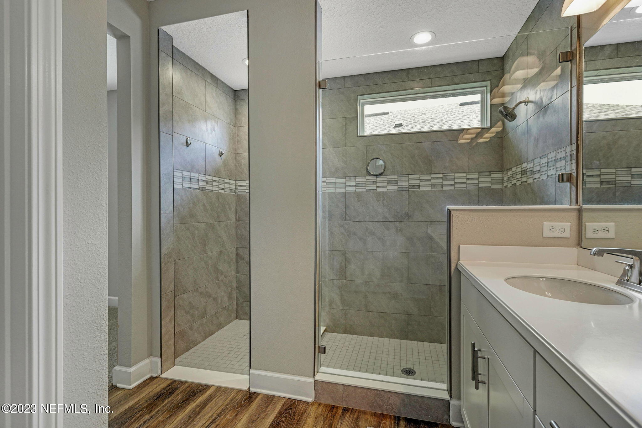 69 Willow Lake Drive St. Augustine, FL 32092 - Photo 16 of 42 a bathroom with a shower and a sink