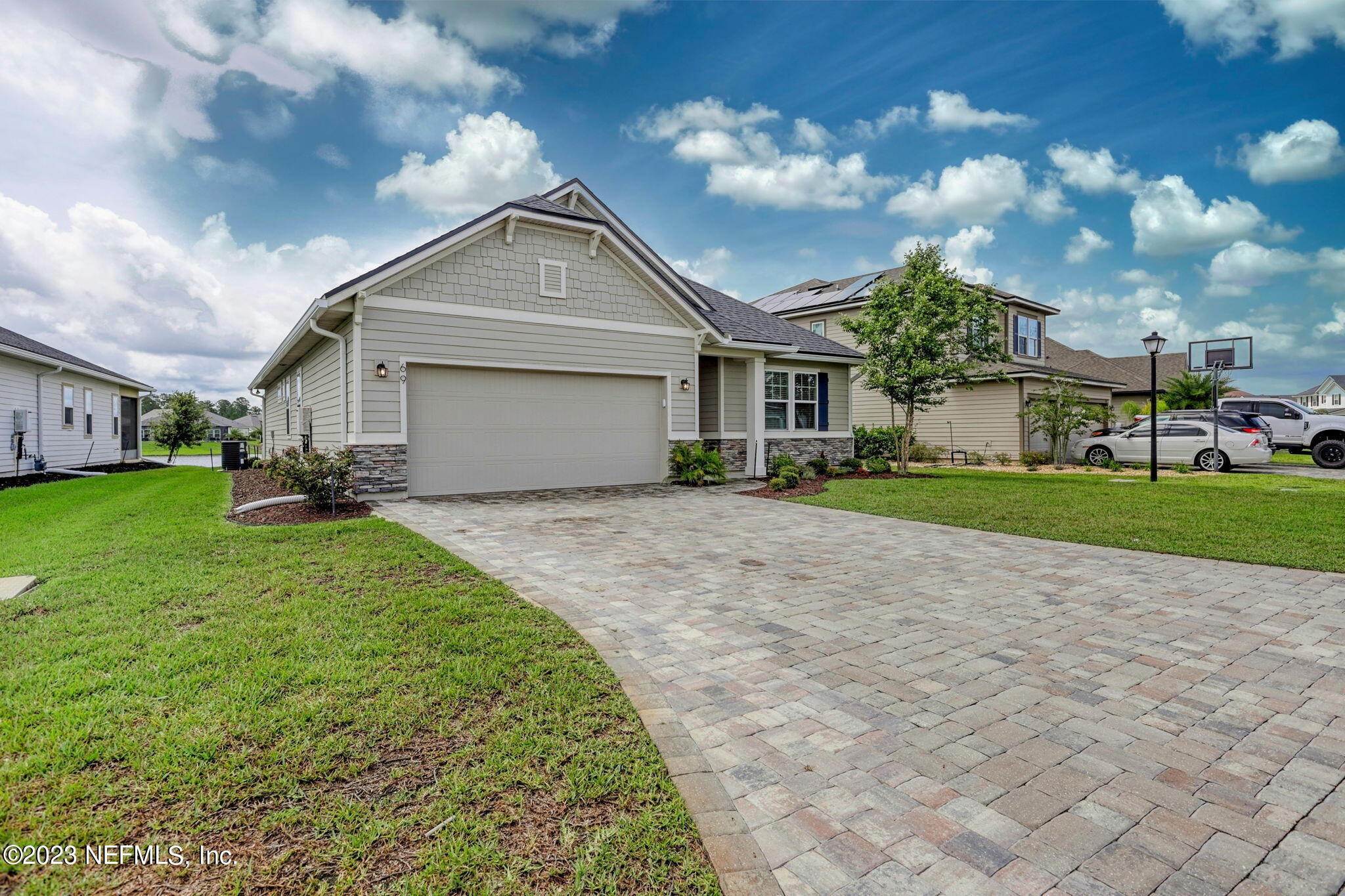 69 Willow Lake Drive St. Augustine, FL 32092 - Photo 2 of 42 a front view of house with yard