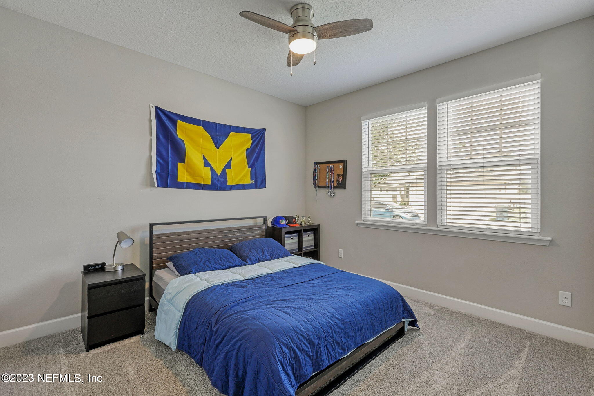 69 Willow Lake Drive St. Augustine, FL 32092 - Photo 22 of 42 a bedroom with a bed and a window