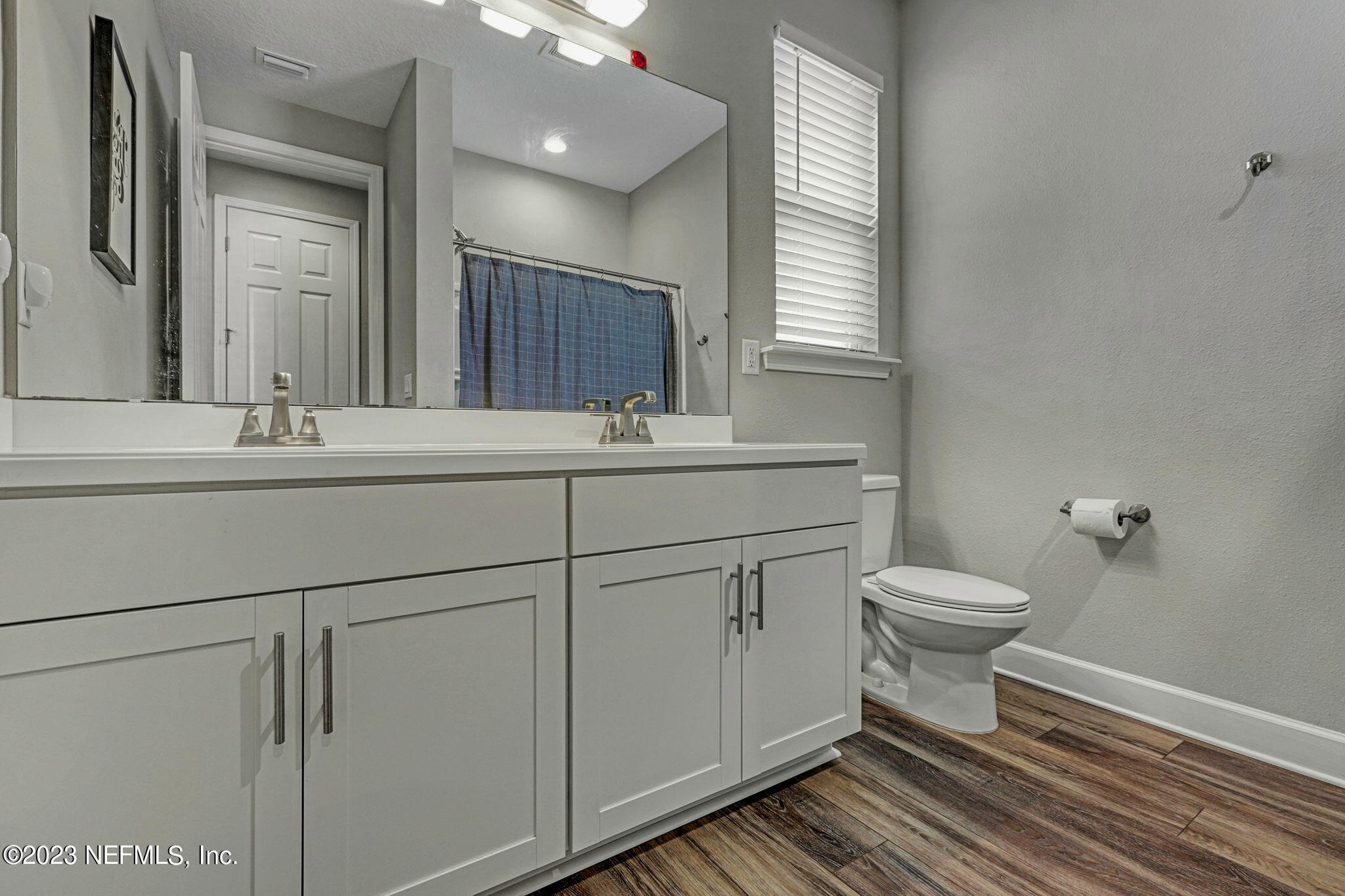 69 Willow Lake Drive St. Augustine, FL 32092 - Photo 24 of 42 a bathroom with a sink toilet and mirror