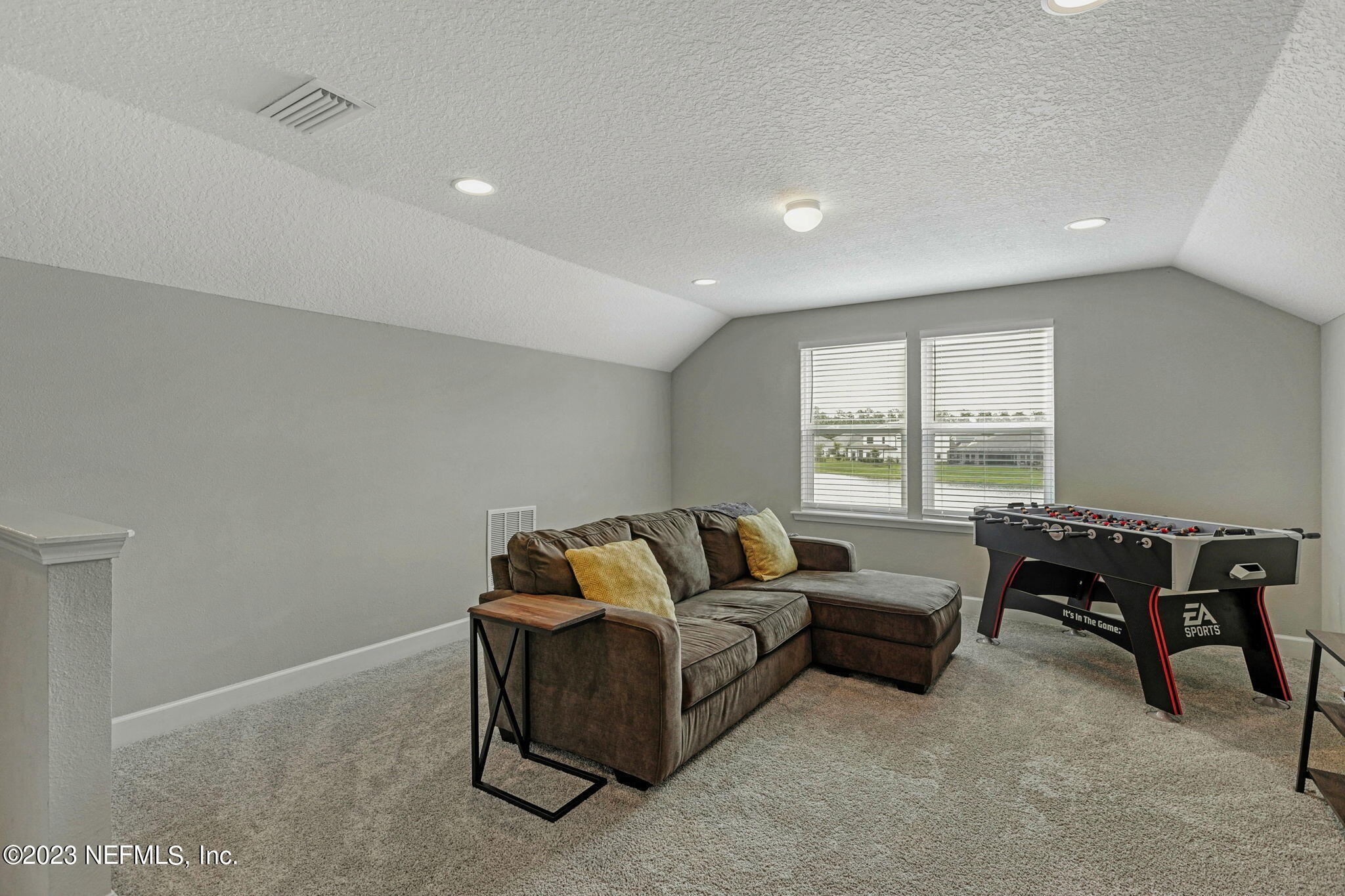 69 Willow Lake Drive St. Augustine, FL 32092 - Photo 29 of 42 a living room with furniture and a window