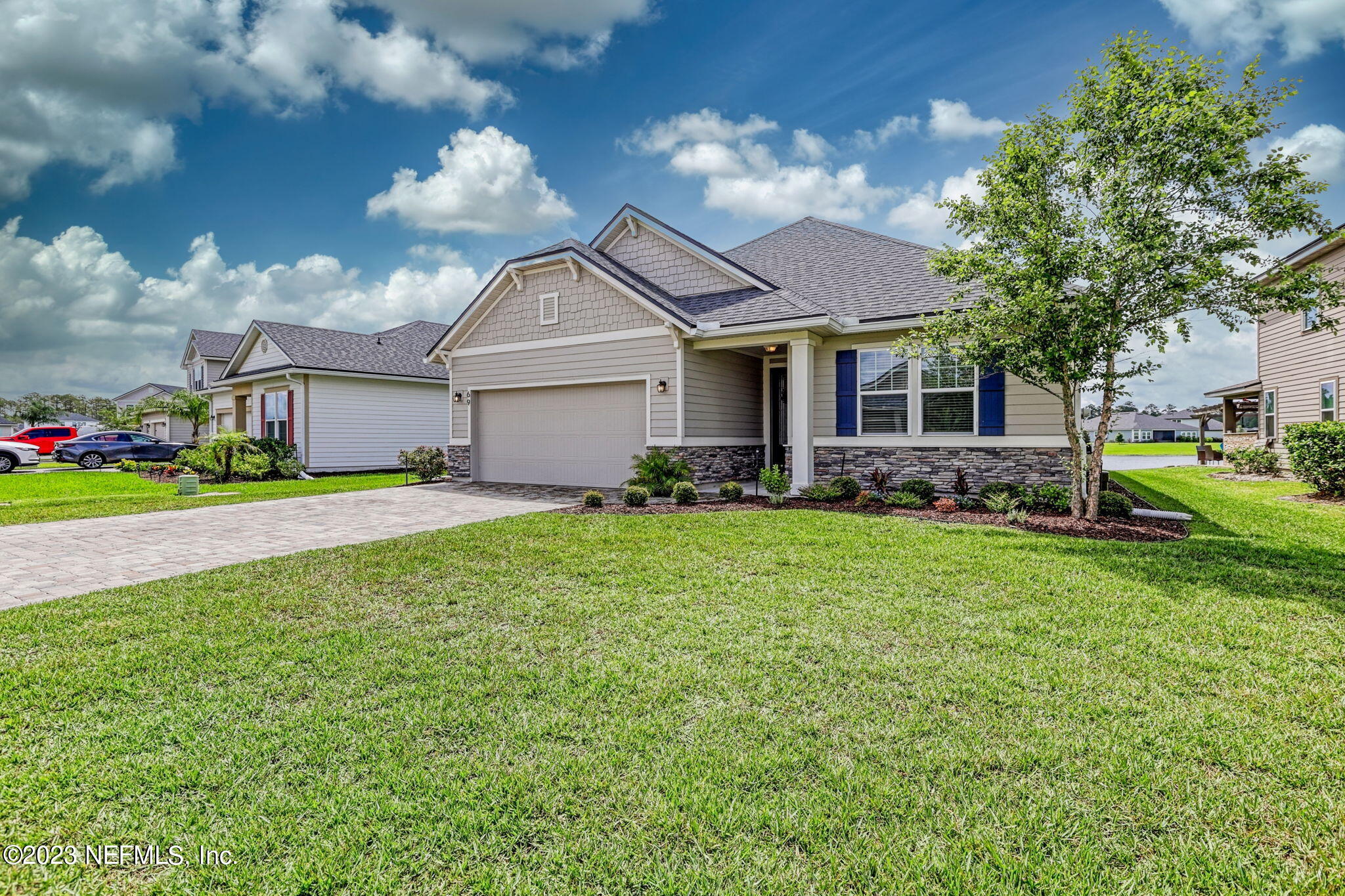 69 Willow Lake Drive St. Augustine, FL 32092 - Photo 3 of 42 a front view of house with yard and green space