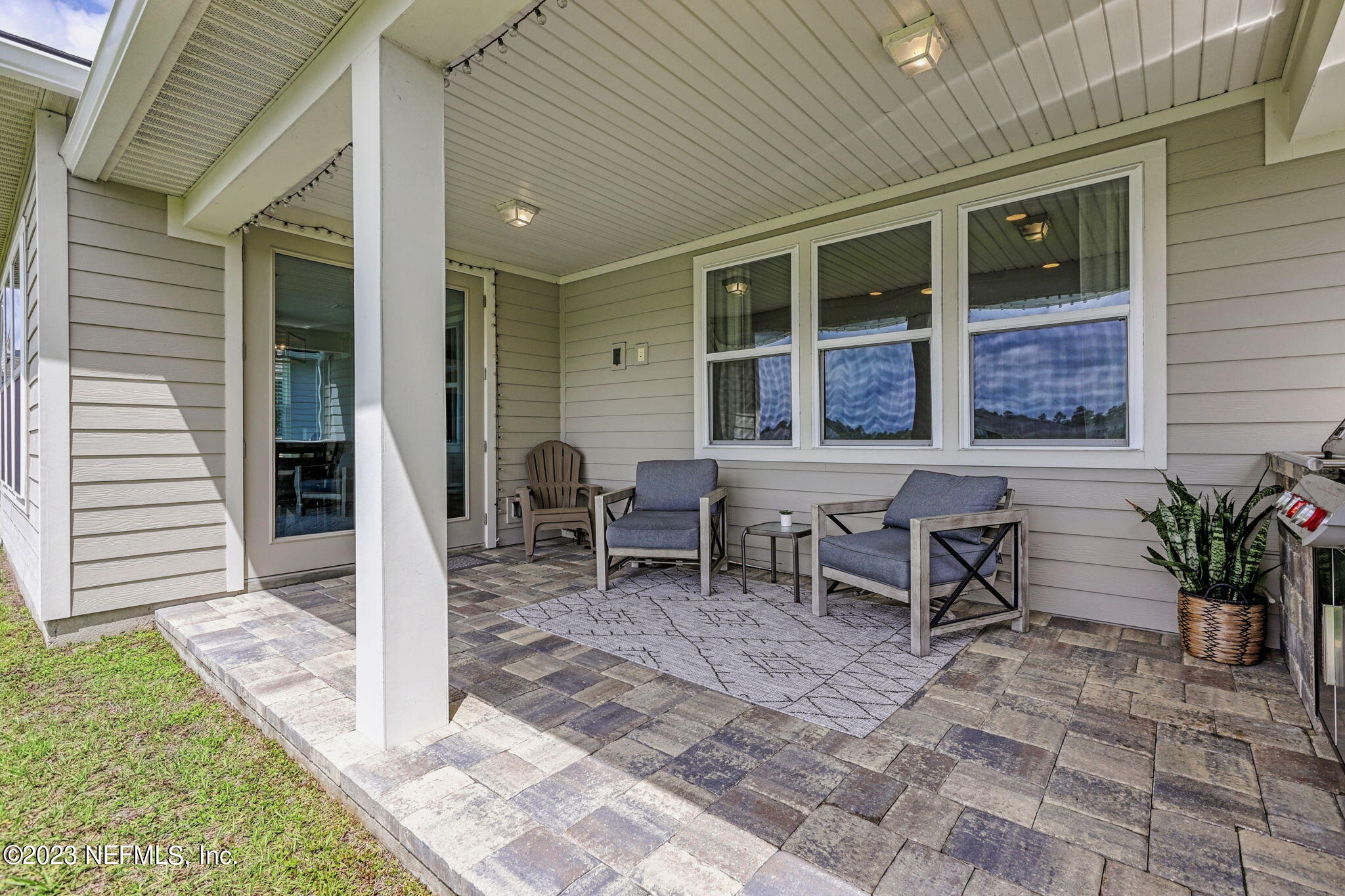 69 Willow Lake Drive St. Augustine, FL 32092 - Photo 38 of 42 a view of a house with backyard and sitting area