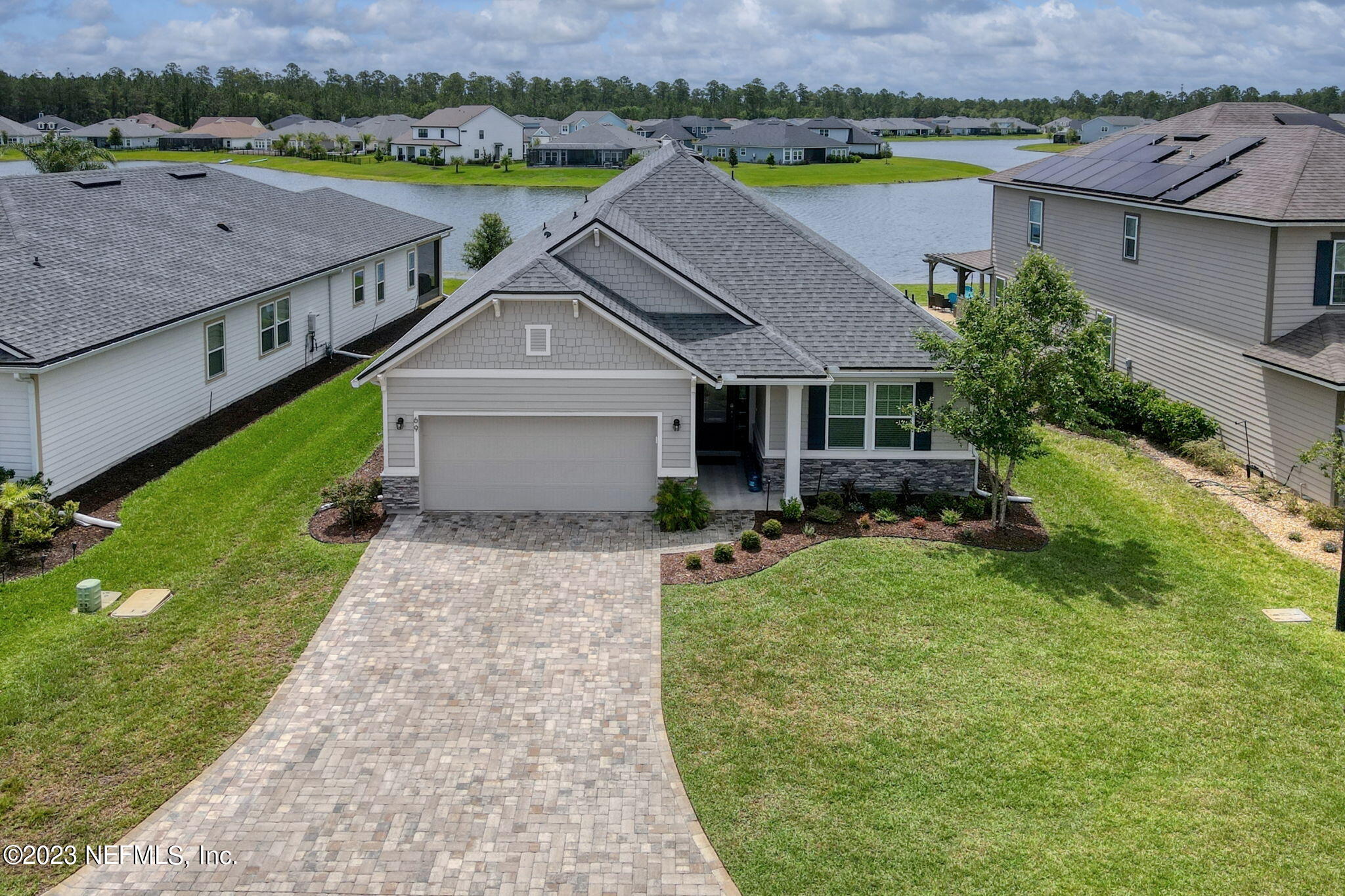 69 Willow Lake Drive St. Augustine, FL 32092 - Photo 40 of 42 an aerial view of a house with a yard and lake view