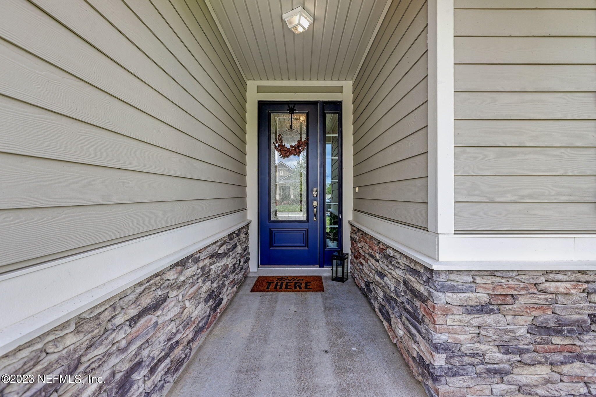 69 Willow Lake Drive St. Augustine, FL 32092 - Photo 4 of 42 a view of front door of house