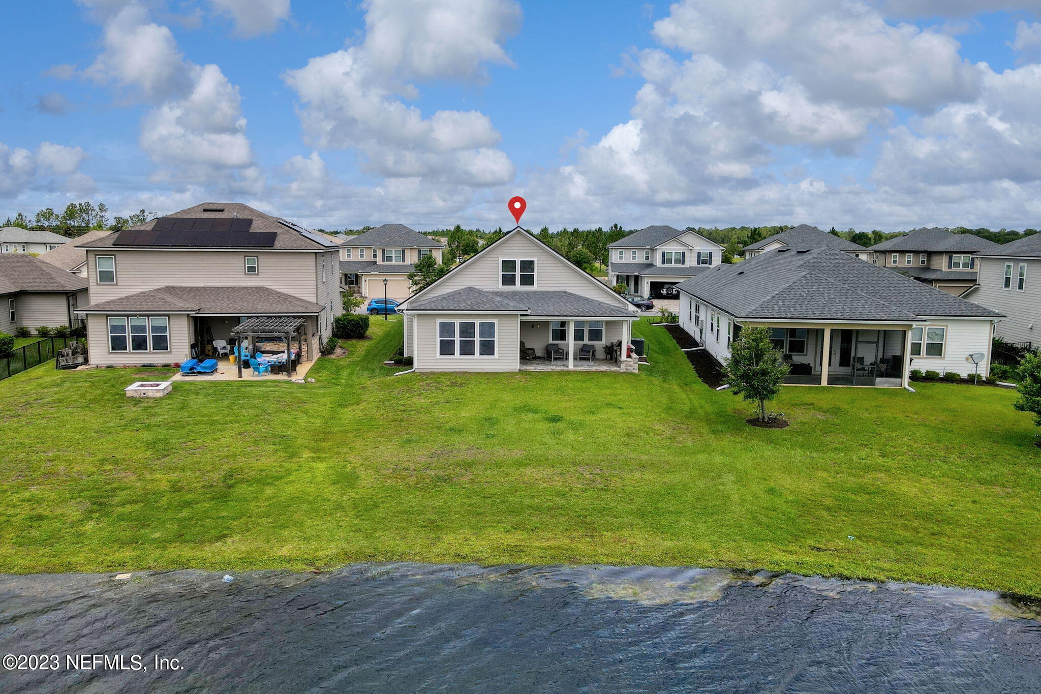 69 Willow Lake Drive St. Augustine, FL 32092 - Photo 42 of 42 a front view of a house with garden