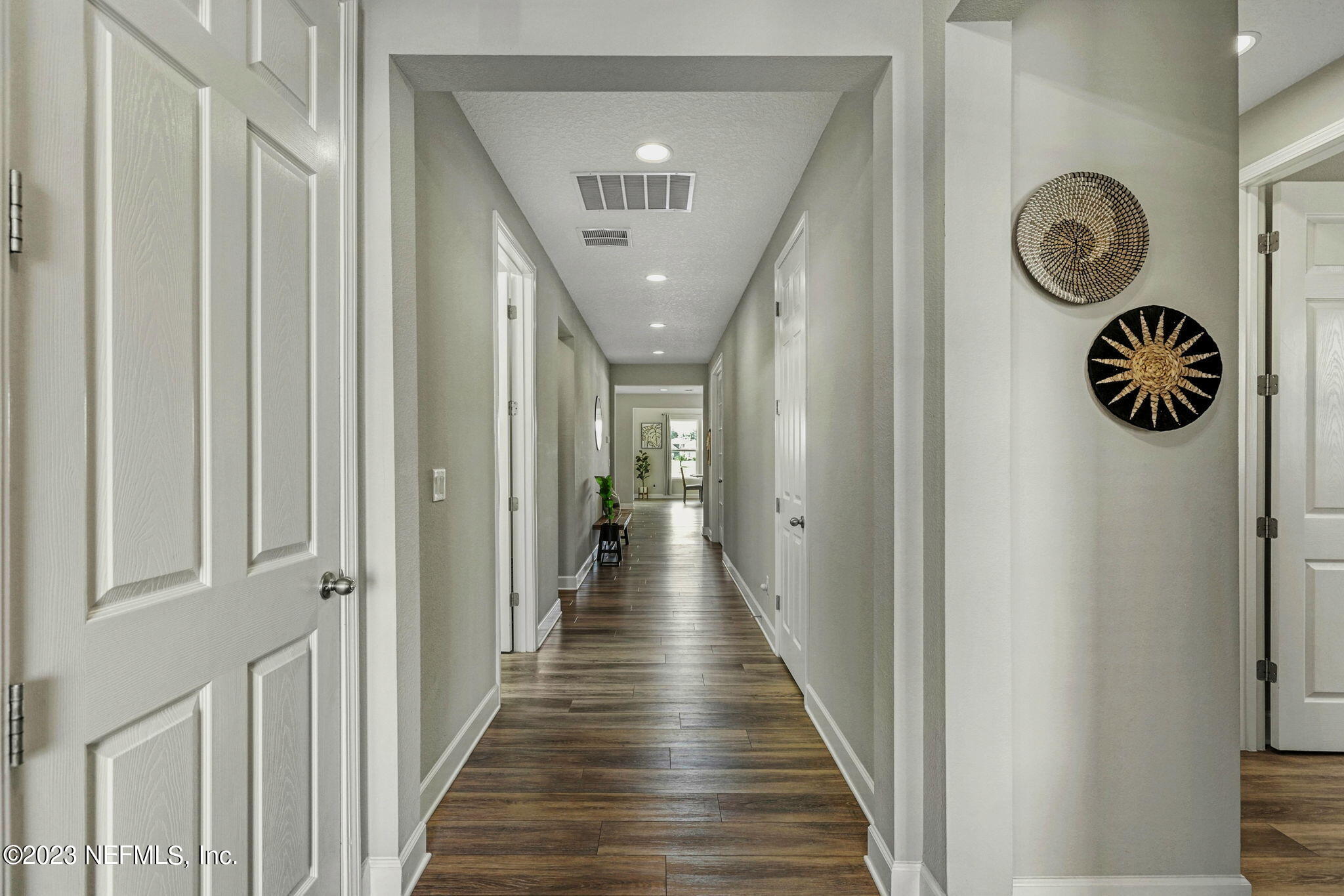 69 Willow Lake Drive St. Augustine, FL 32092 - Photo 5 of 42 a view of a hallway with wooden floor