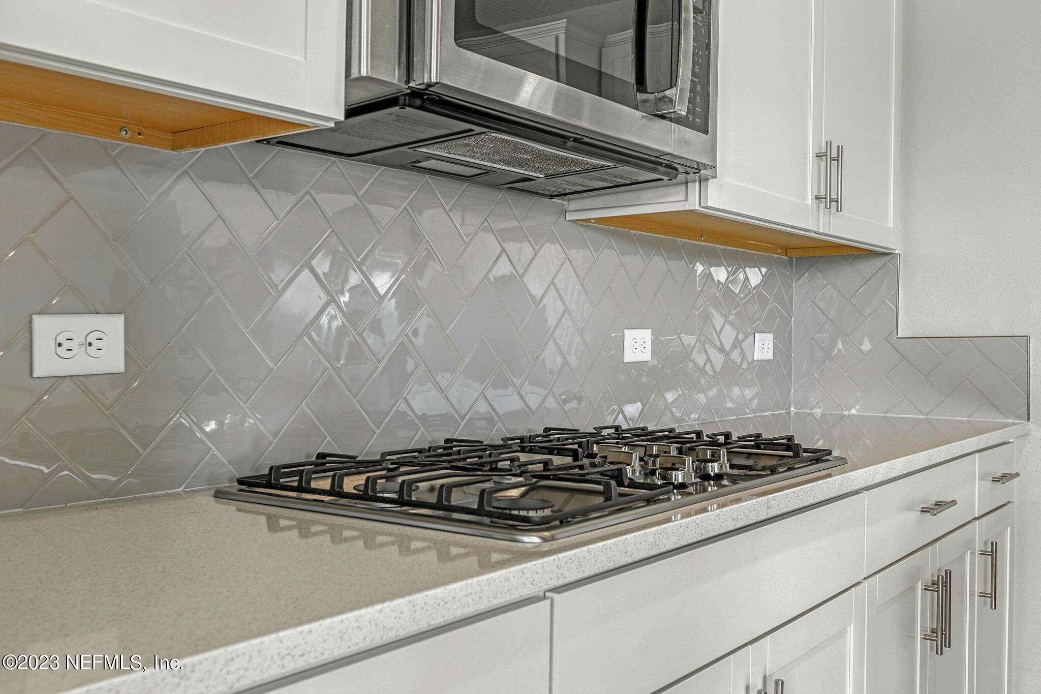 69 Willow Lake Drive St. Augustine, FL 32092 - Photo 9 of 42 a stove top oven sitting inside of a kitchen