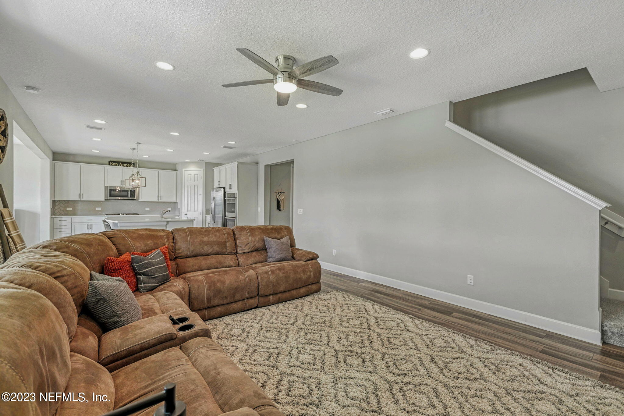 69 Willow Lake Drive St. Augustine, FL 32092 - Photo 10 of 42 a living room with furniture and a rug
