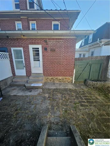 a view of backyard of house