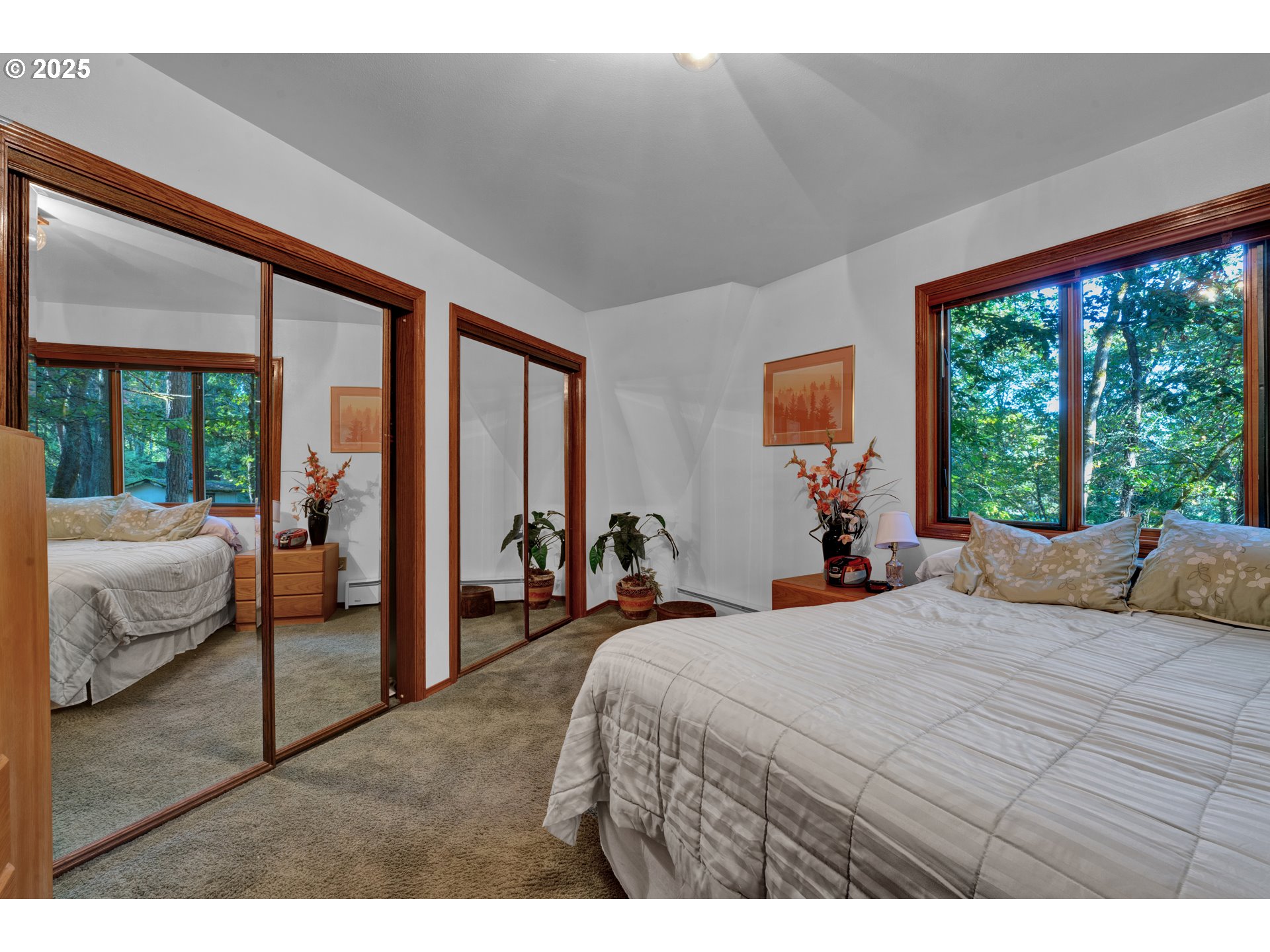 434 East 39th Avenue Eugene, OR 97405 - Photo 18 of 48 a bedroom with a large bed and a large window