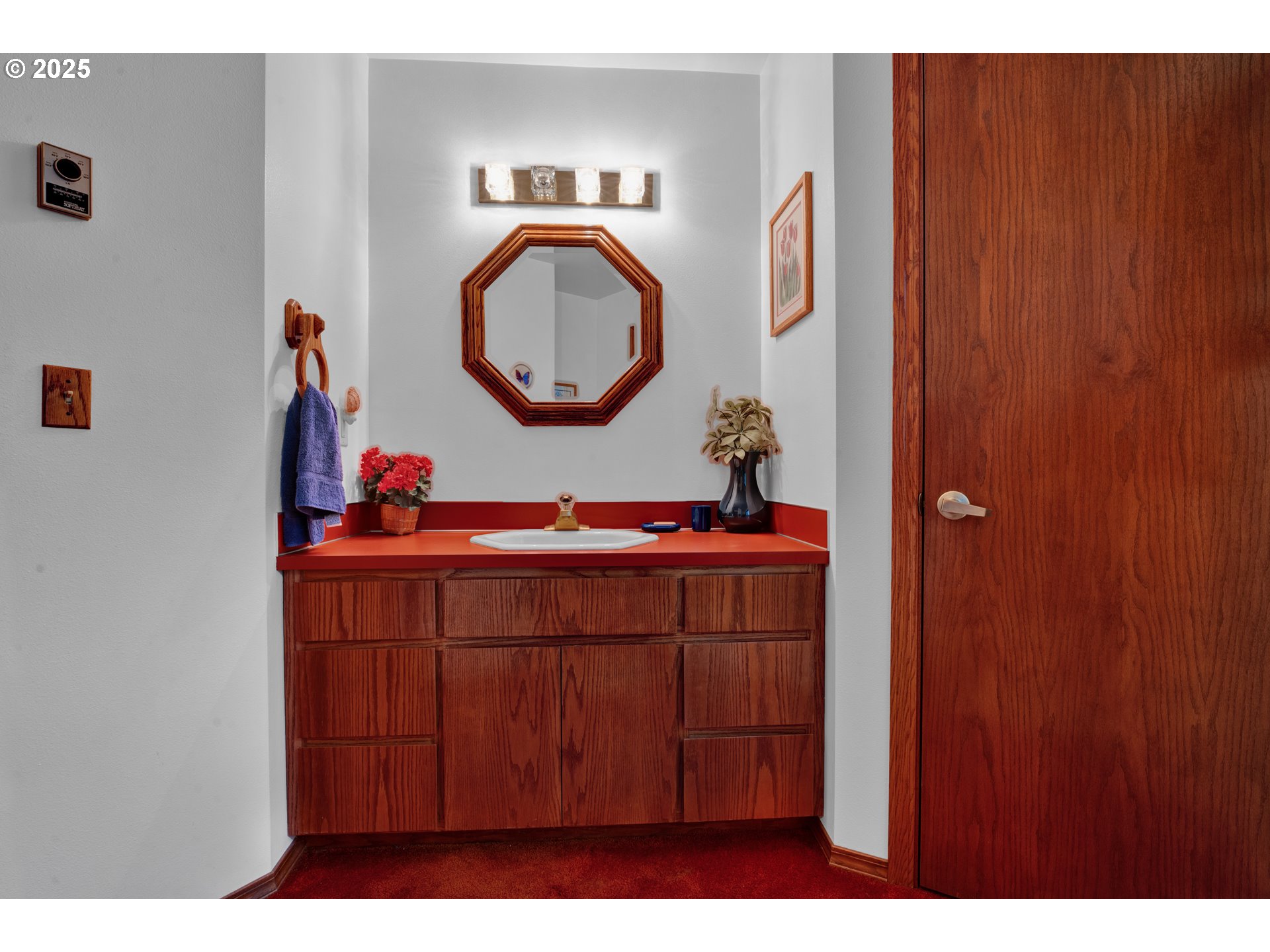 434 East 39th Avenue Eugene, OR 97405 - Photo 22 of 48 a bathroom with a sink and a mirror