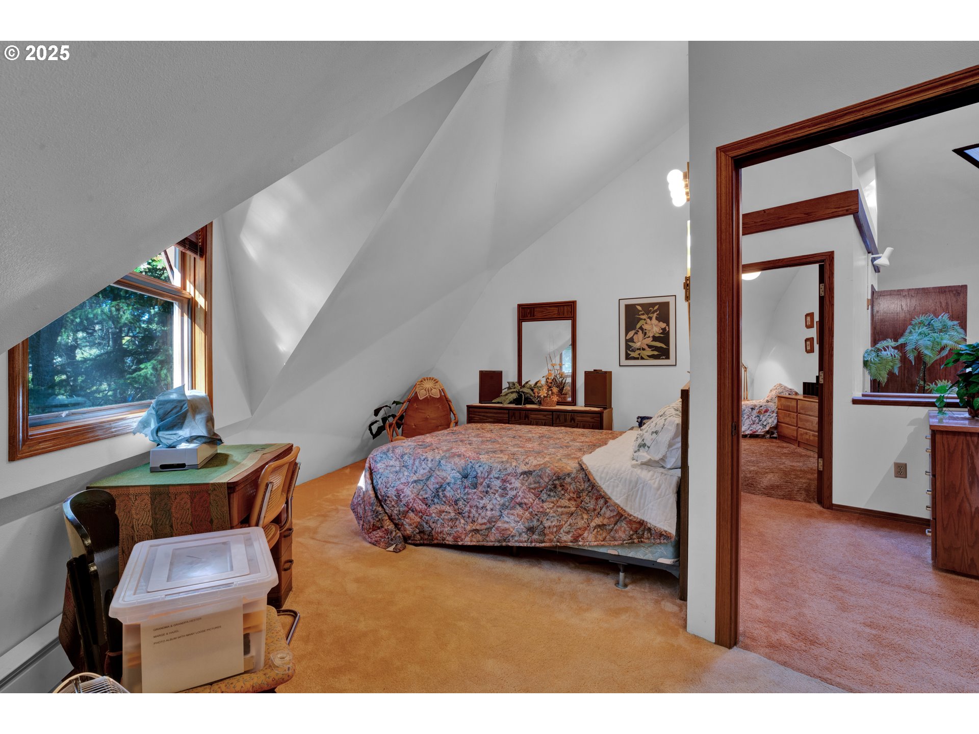 434 East 39th Avenue Eugene, OR 97405 - Photo 23 of 48 a bedroom with furniture and a wooden floor