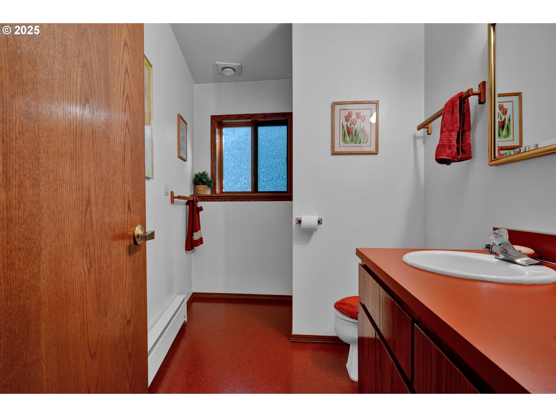 434 East 39th Avenue Eugene, OR 97405 - Photo 35 of 48 a bathroom with a sink and a mirror
