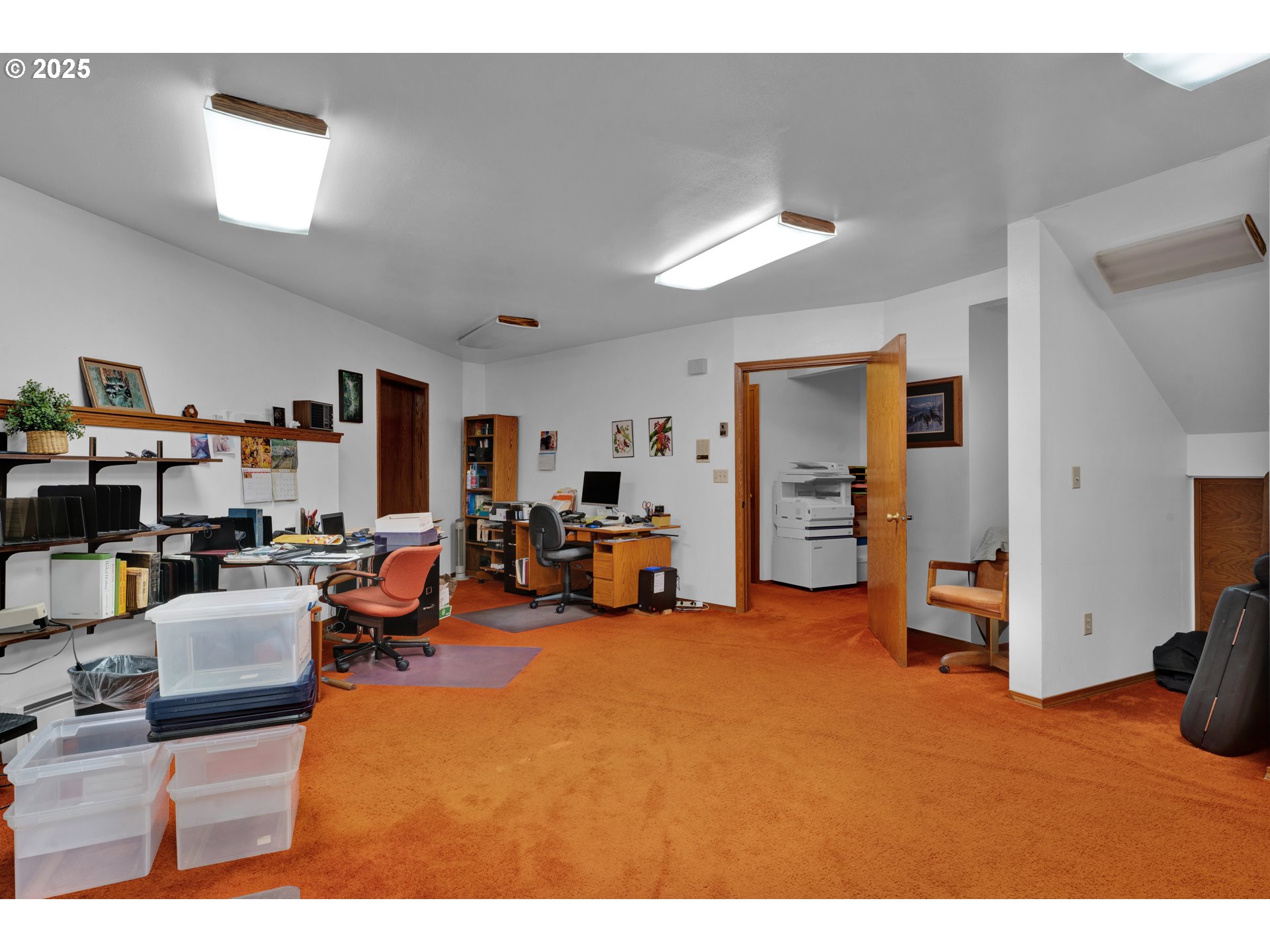 434 East 39th Avenue Eugene, OR 97405 - Photo 39 of 48 a living room with furniture and a flat screen tv