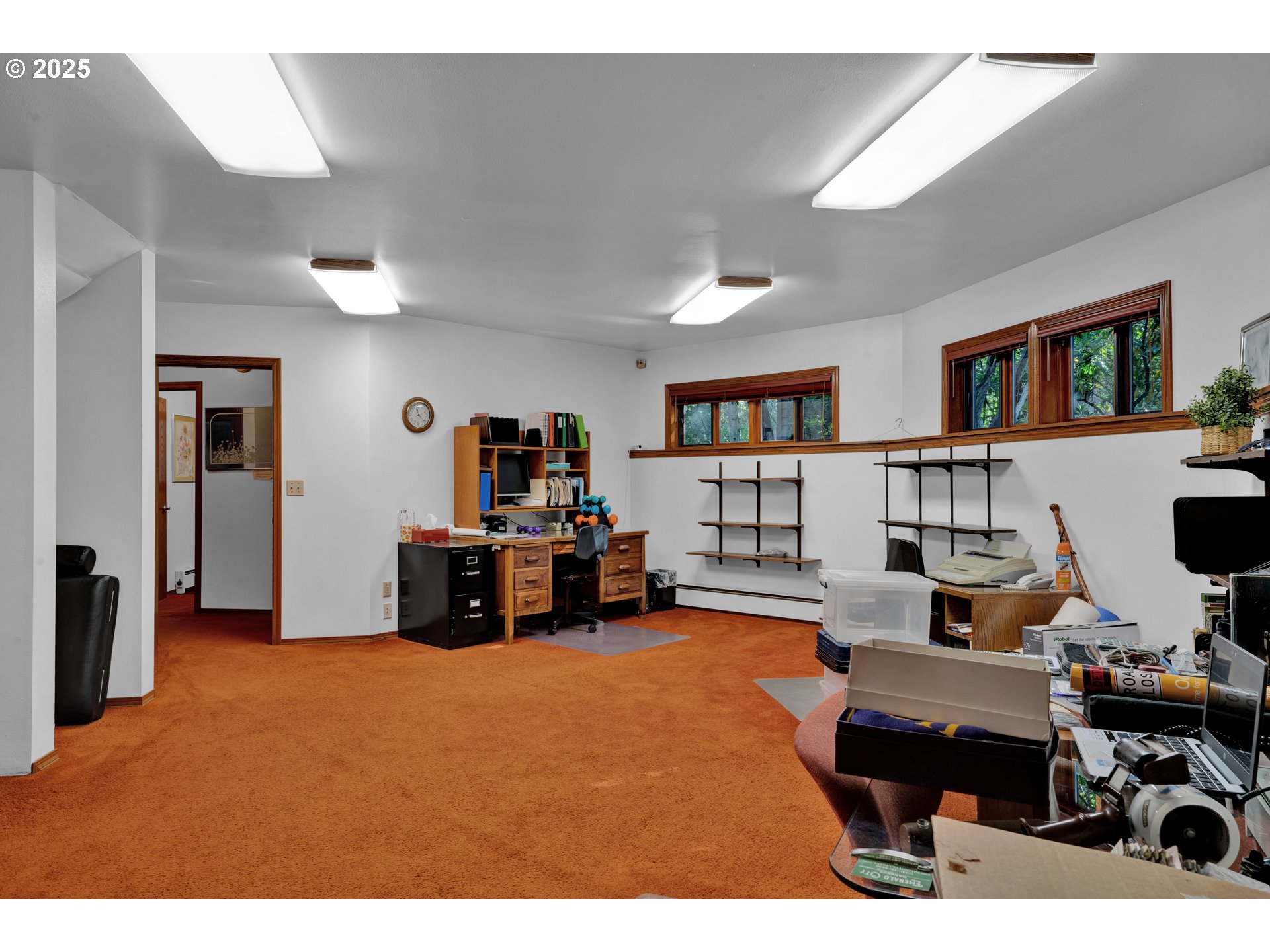 434 East 39th Avenue Eugene, OR 97405 - Photo 40 of 48 a bedroom with furniture and a book shelf