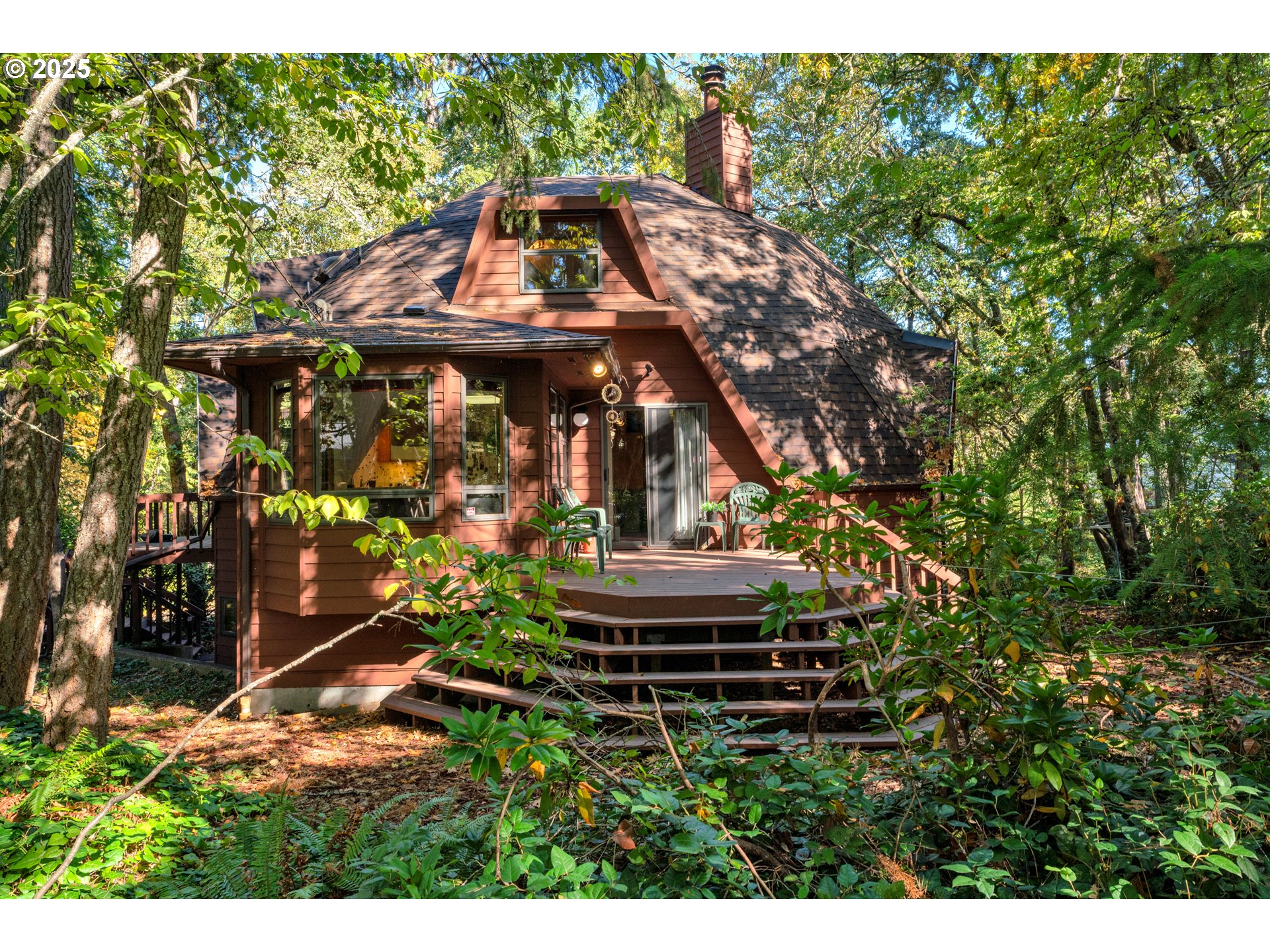 434 East 39th Avenue Eugene, OR 97405 - Photo 45 of 48 a view of a yard in front of a house with a tree