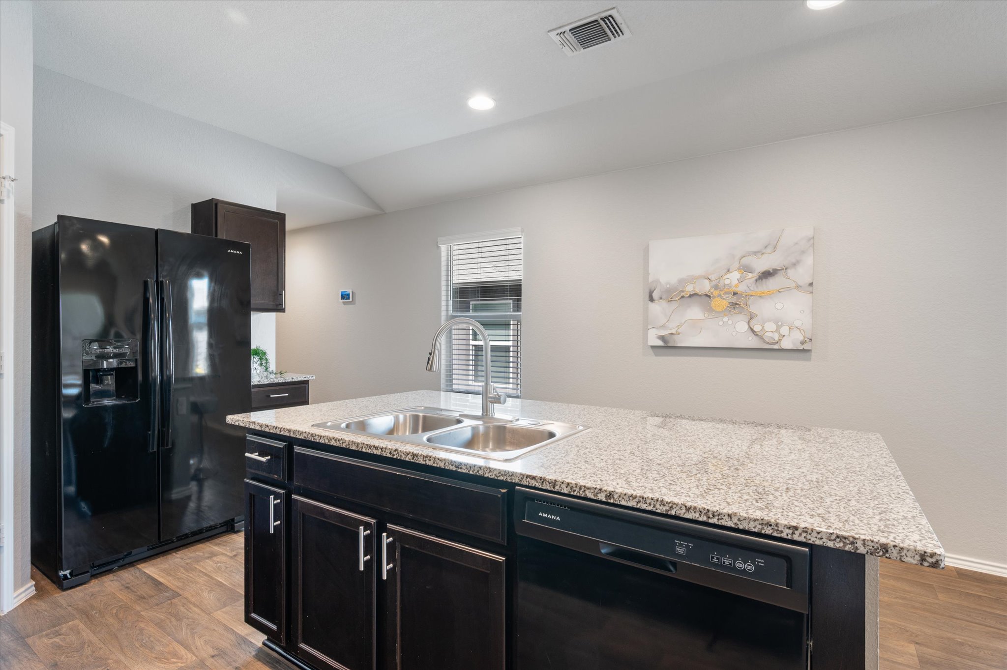 15003 Tuff Road Manor, TX 78653 - Photo 11 of 27 a bathroom with a granite countertop sink a mirror and a shower