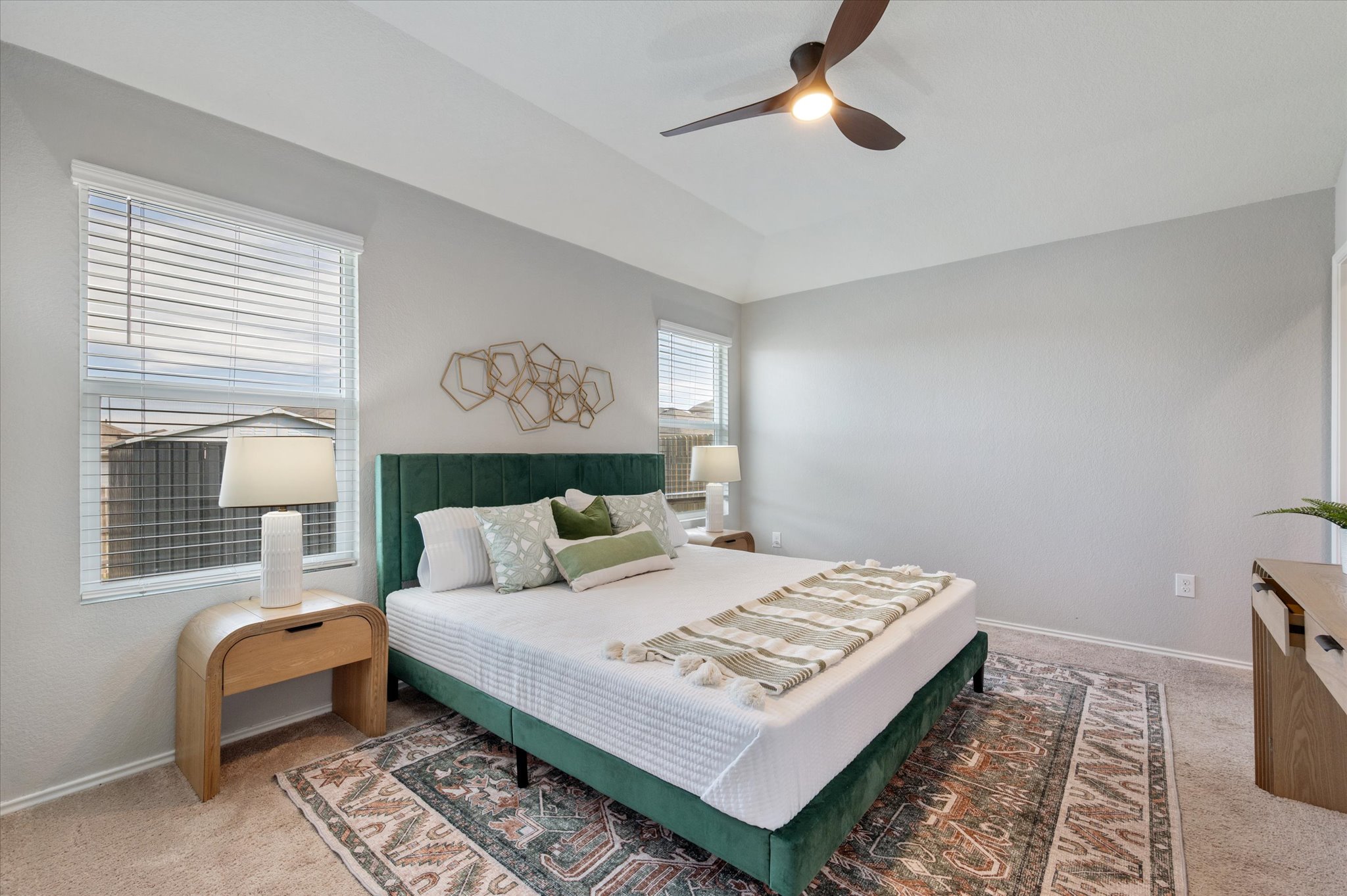 15003 Tuff Road Manor, TX 78653 - Photo 12 of 27 a bedroom with a bed lamp and a rug