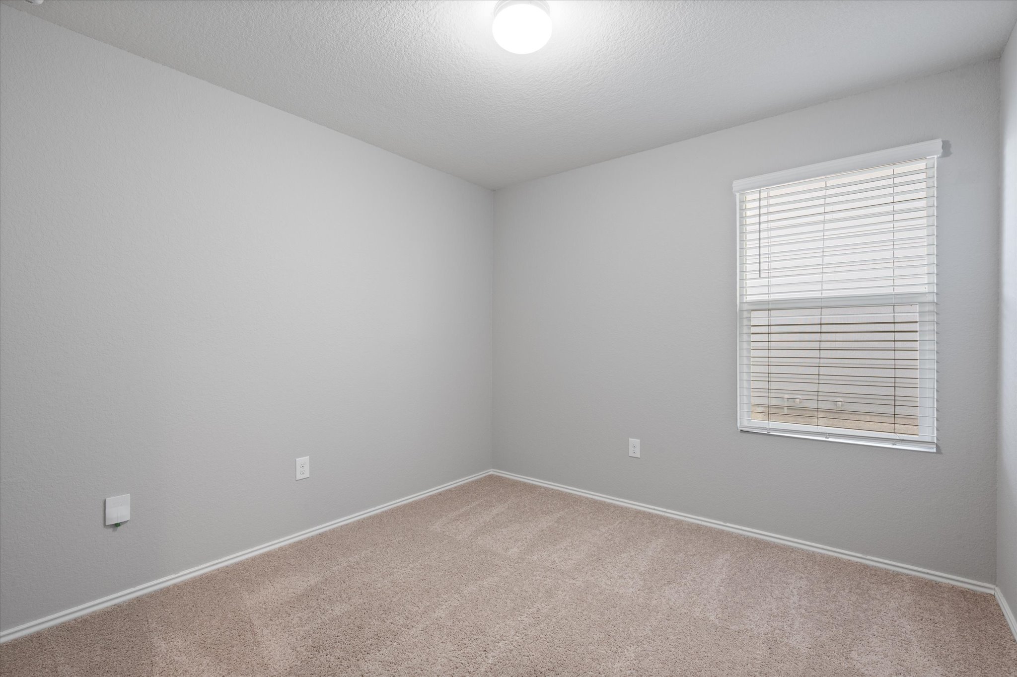 15003 Tuff Road Manor, TX 78653 - Photo 14 of 27 an empty room with a window