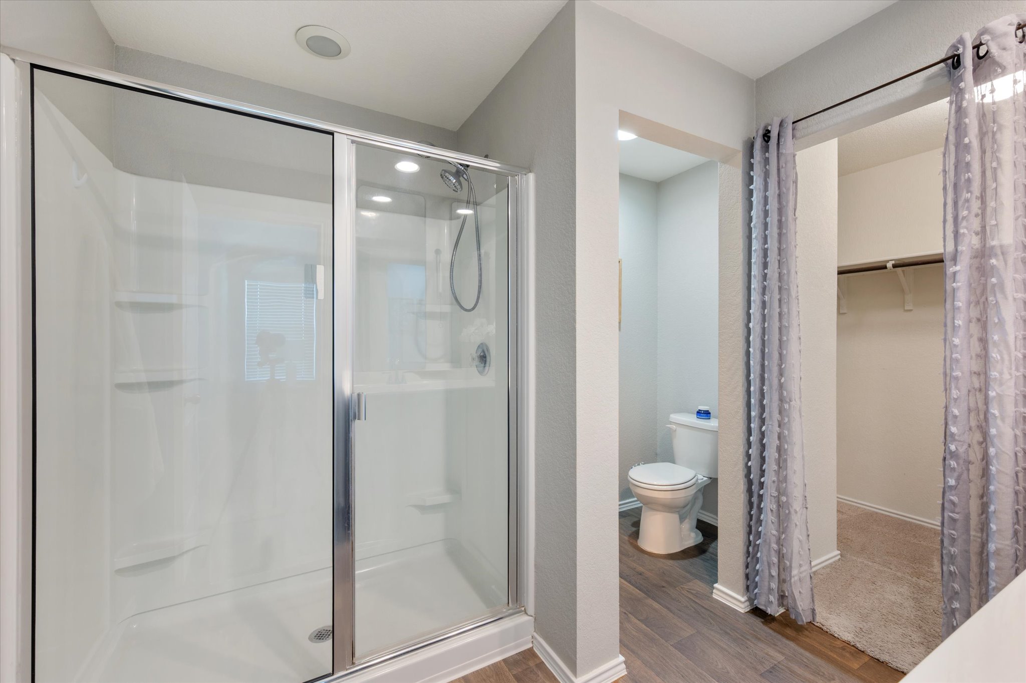 15003 Tuff Road Manor, TX 78653 - Photo 20 of 27 a bathroom with a shower and a toilet