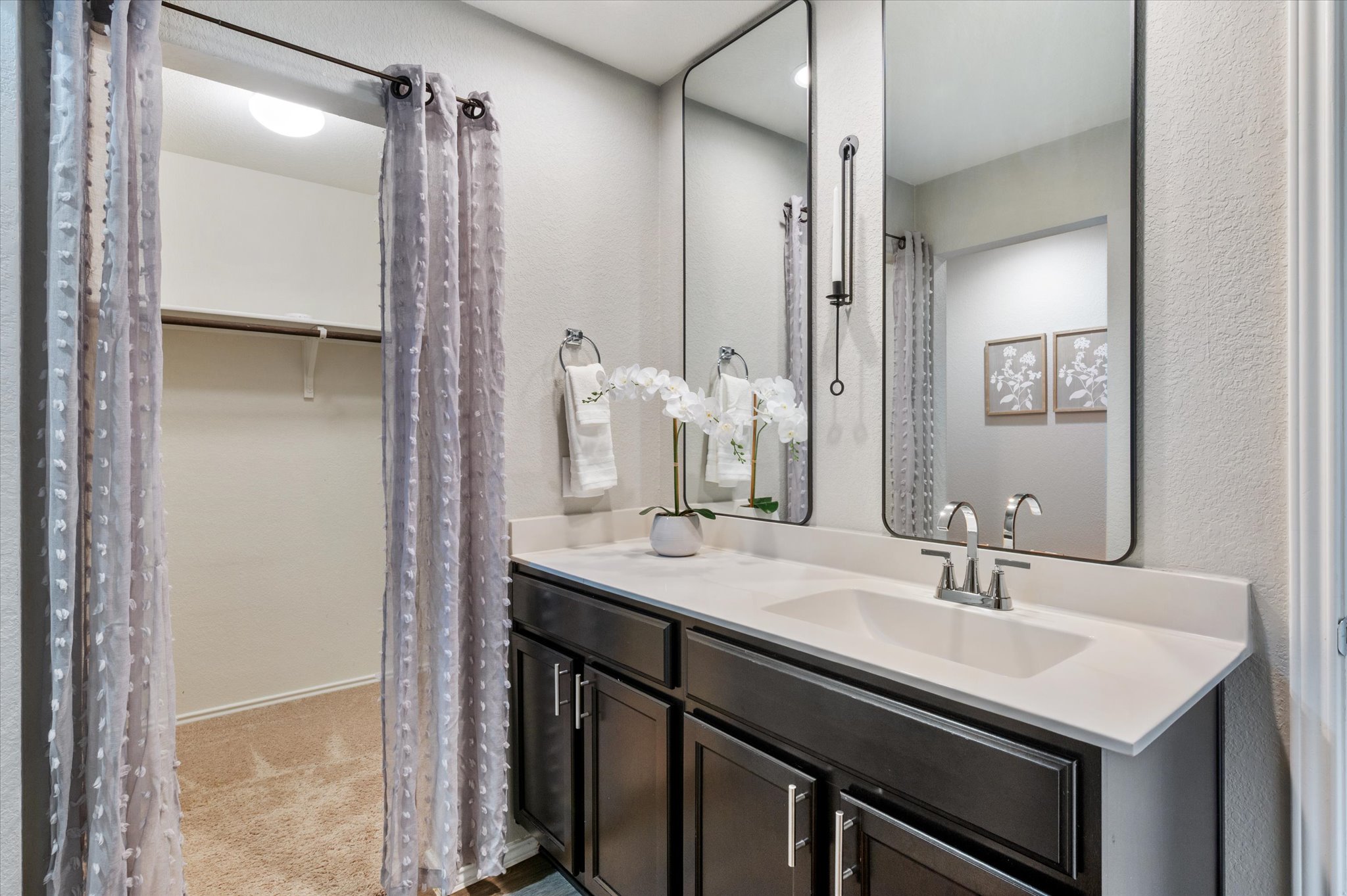 15003 Tuff Road Manor, TX 78653 - Photo 21 of 27 a bathroom with a sink and a mirror