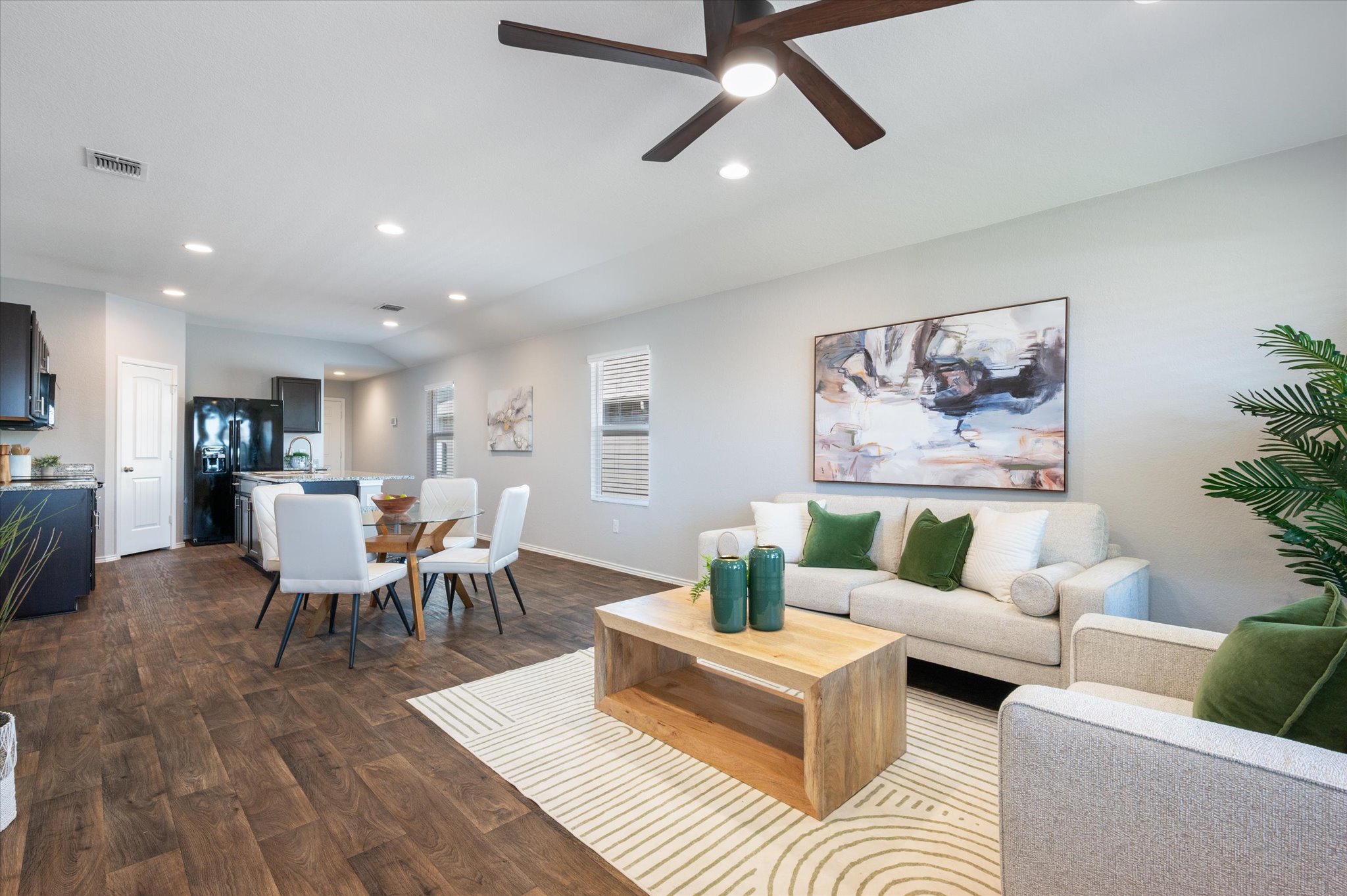 15003 Tuff Road Manor, TX 78653 - Photo 7 of 27 a living room with furniture and a wooden floor