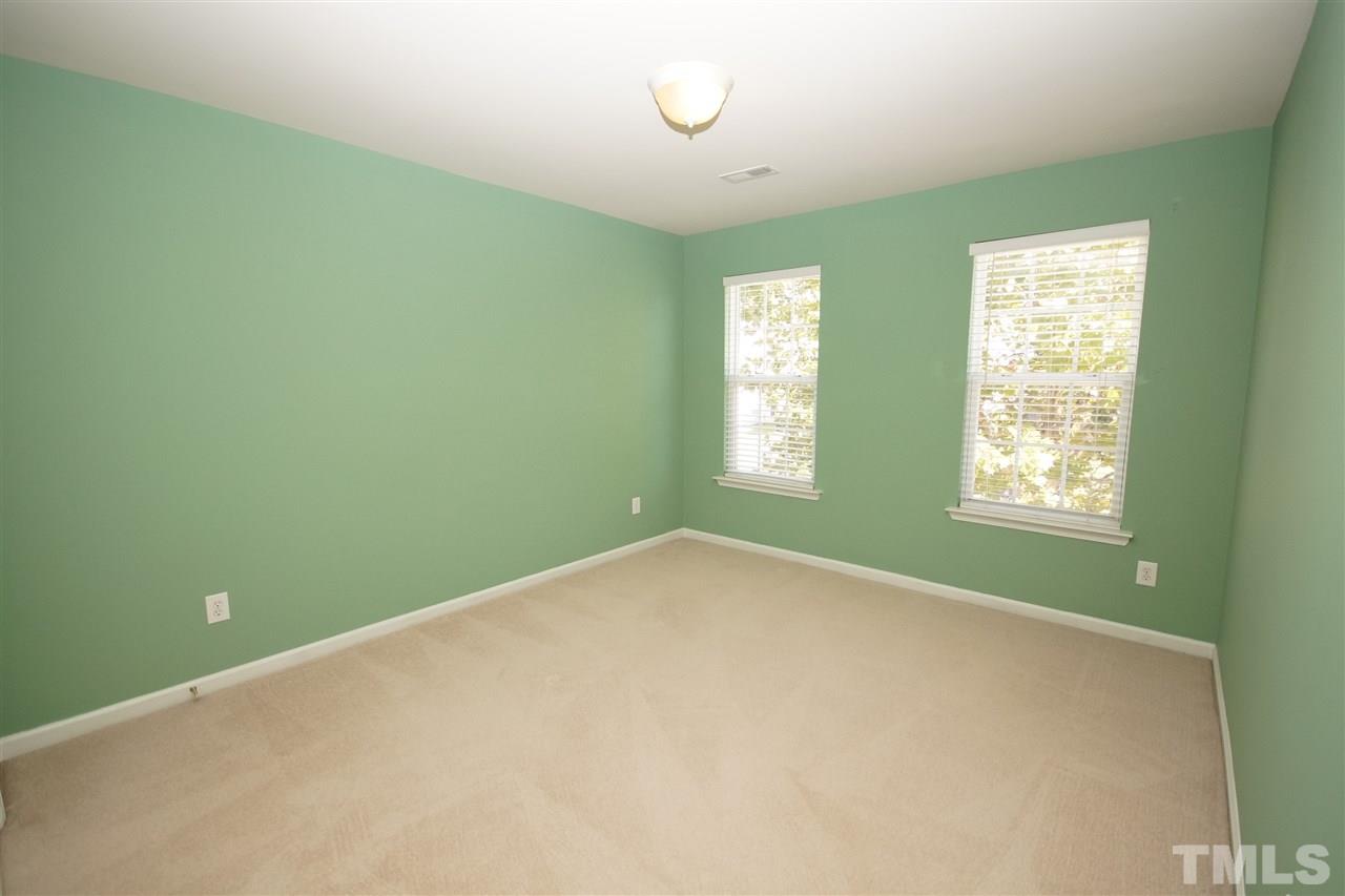 7449 Lagrange Drive Raleigh, NC 27613 - Photo 18 of 24 a view of an empty room with a window