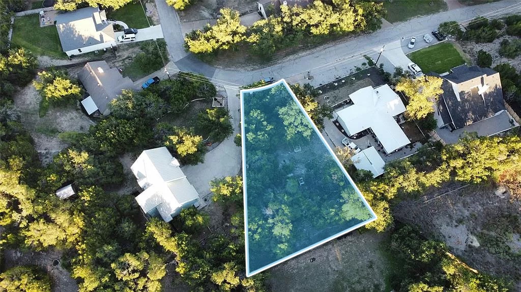 618 Galston Spicewood, TX 78669 - Photo 4 of 14 an aerial view of a house with a yard and garden