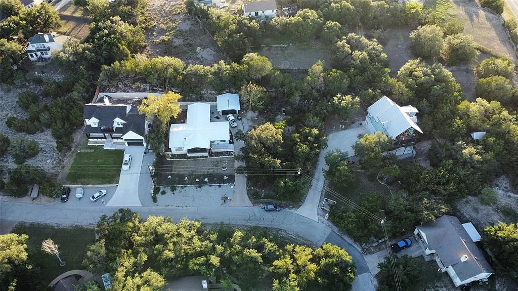 618 Galston Spicewood, TX 78669 - Photo 6 of 14 an aerial view of a house with a yard and garden