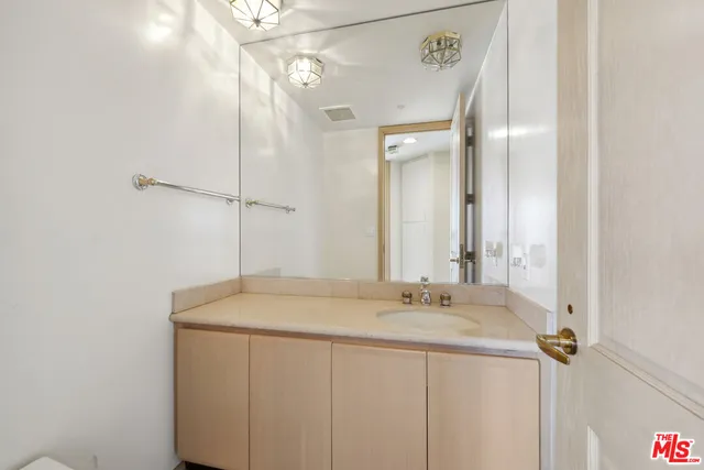 an empty room with sliding glass door