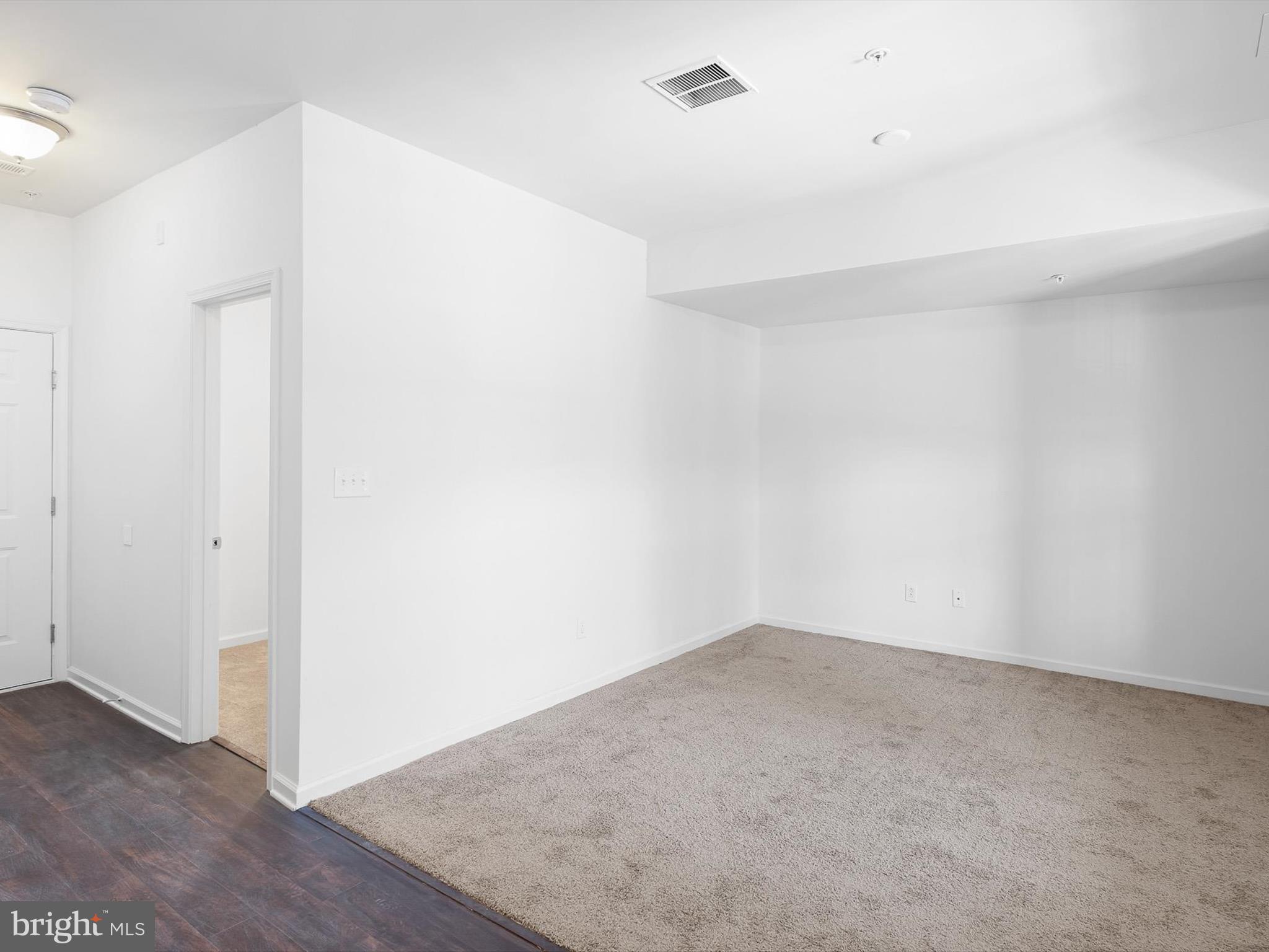 415 Lenape Way Claymont, DE 19703 - Photo 5 of 26 a view of an empty room