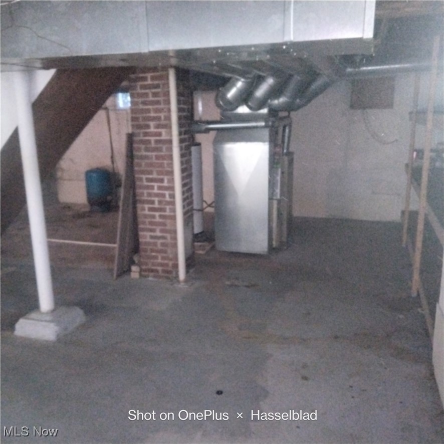 1952 Hubbard Masury Road Hubbard, OH 44425 - Photo 8 of 20 Unfinished below grade area featuring heating unit