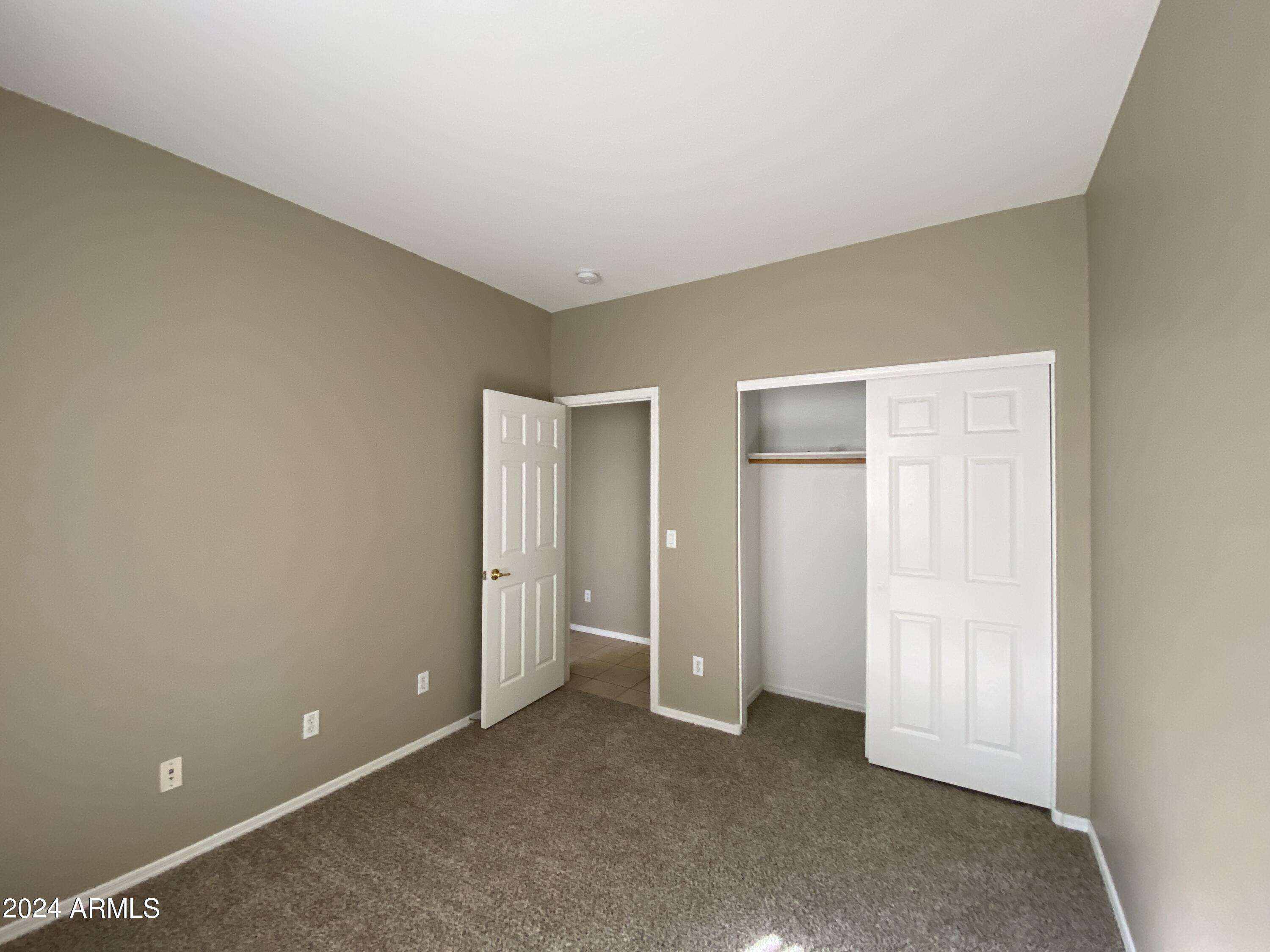 7217 West Kings Avenue Peoria, AZ 85382 - Photo 19 of 19 an empty room with closet area