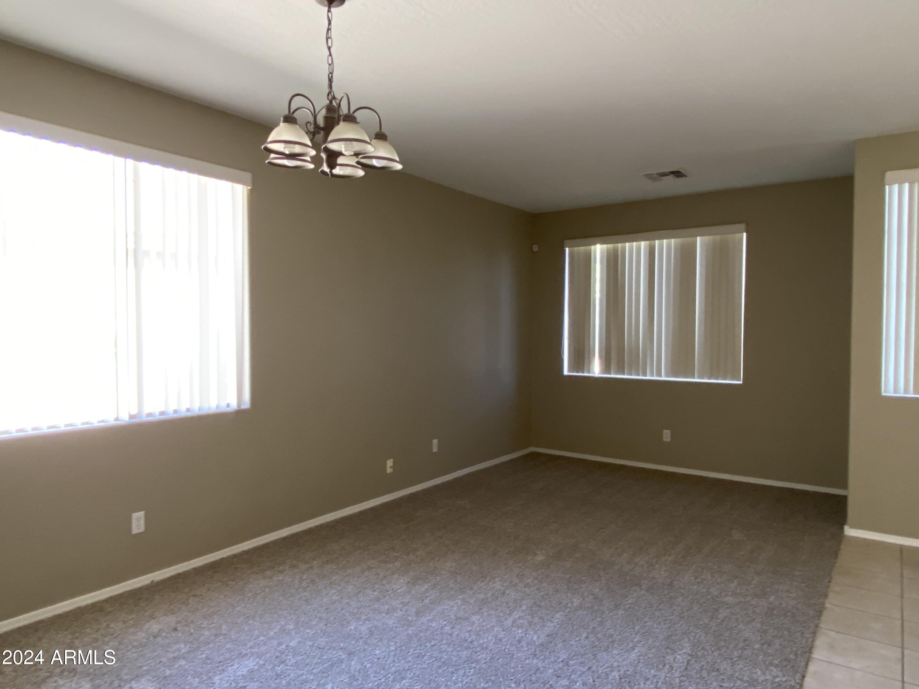 7217 West Kings Avenue Peoria, AZ 85382 - Photo 2 of 19 a view of empty room with window