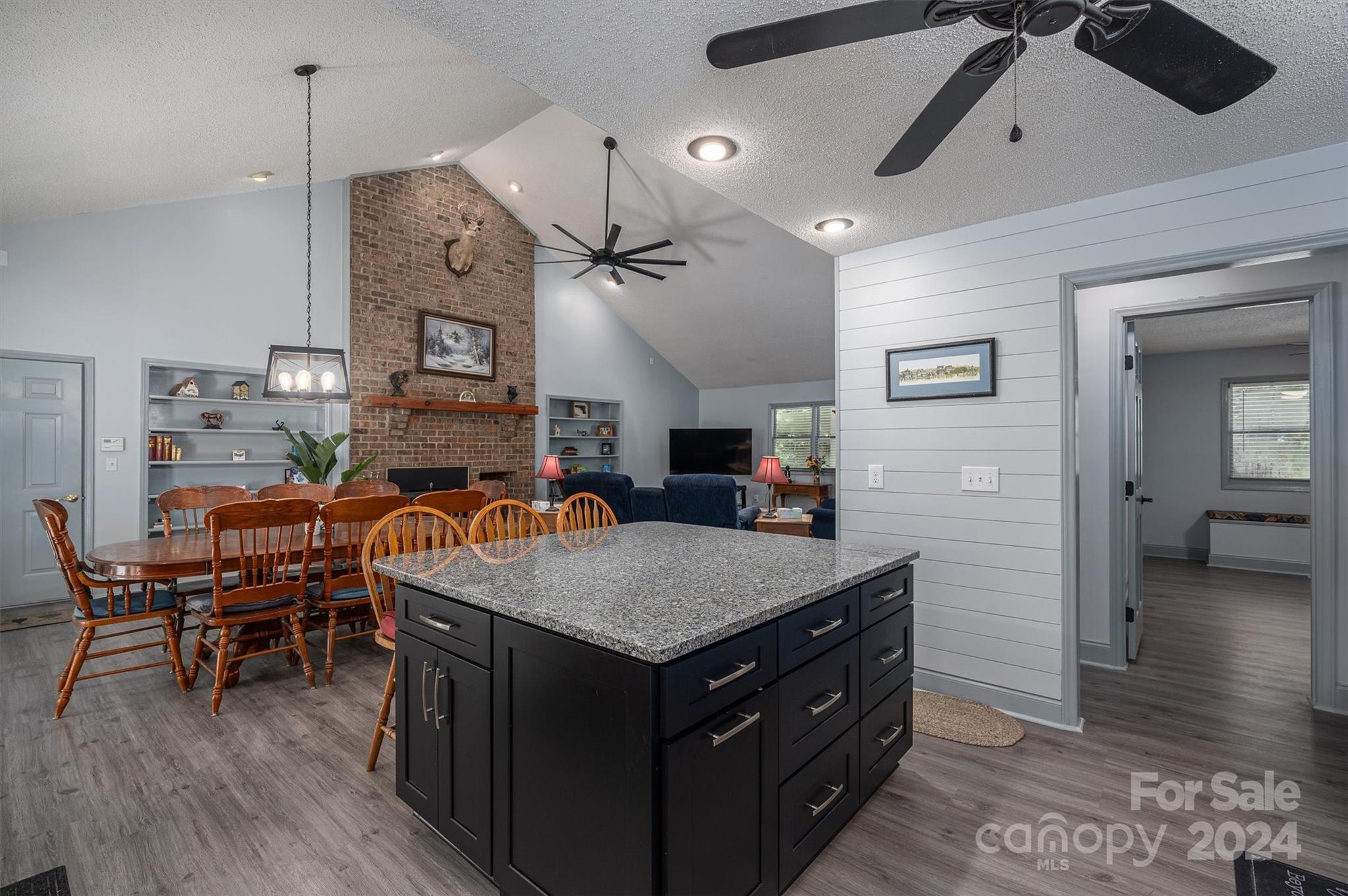 459 Patrick Road Gastonia, NC 28056 - Photo 15 of 39 a kitchen with a stove and a table