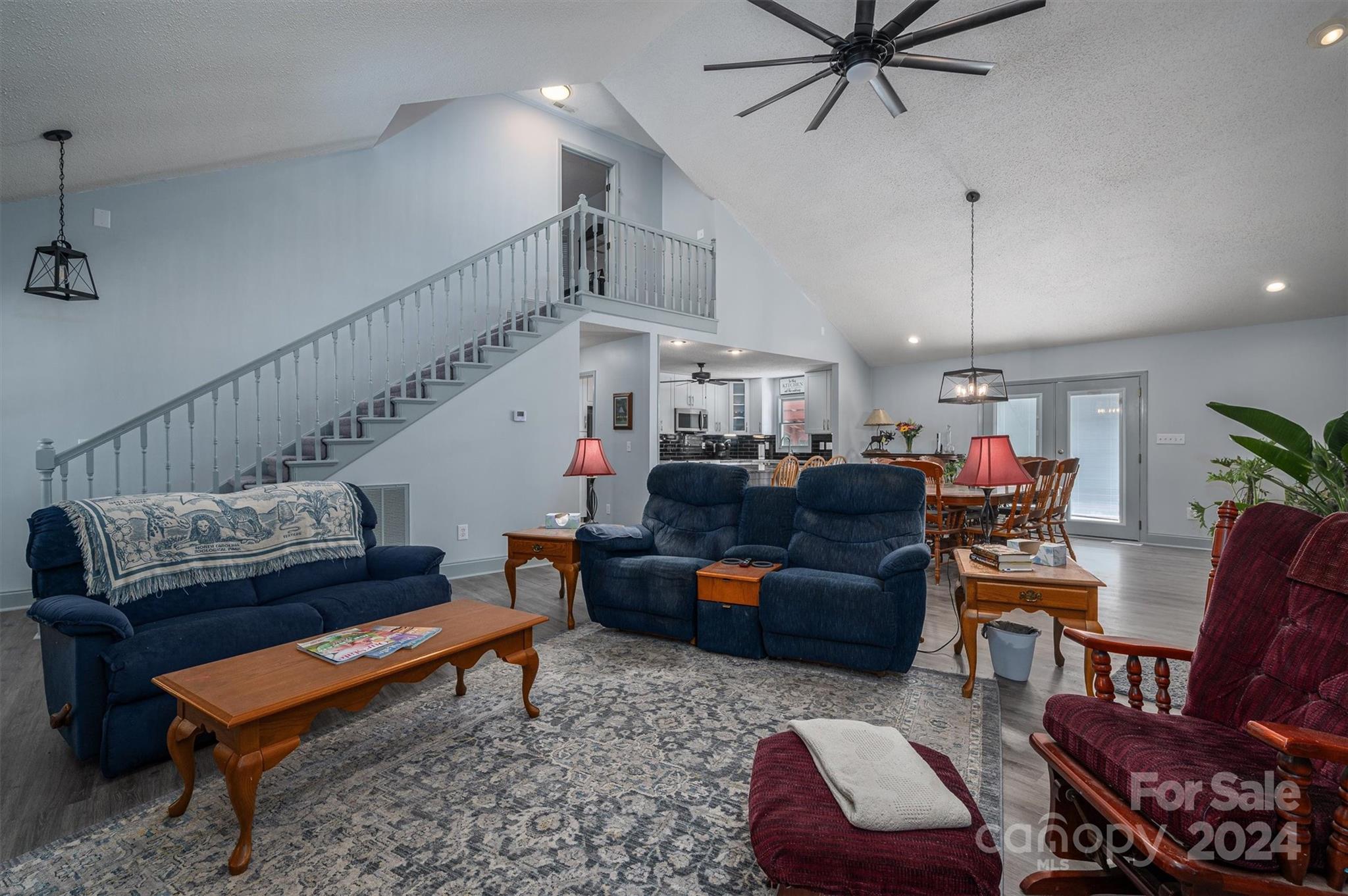 459 Patrick Road Gastonia, NC 28056 - Photo 18 of 39 a living room with furniture and a ceiling fan