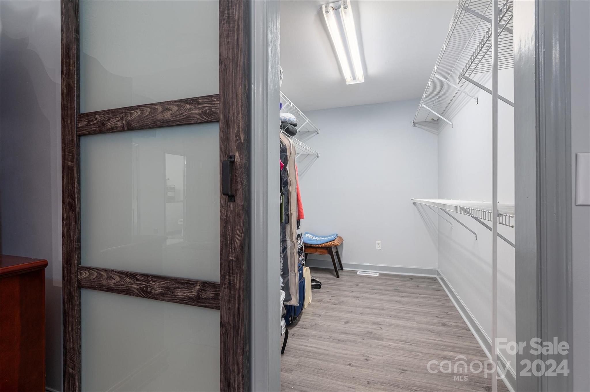 459 Patrick Road Gastonia, NC 28056 - Photo 23 of 39 a view of a hallway with wooden floor and staircase