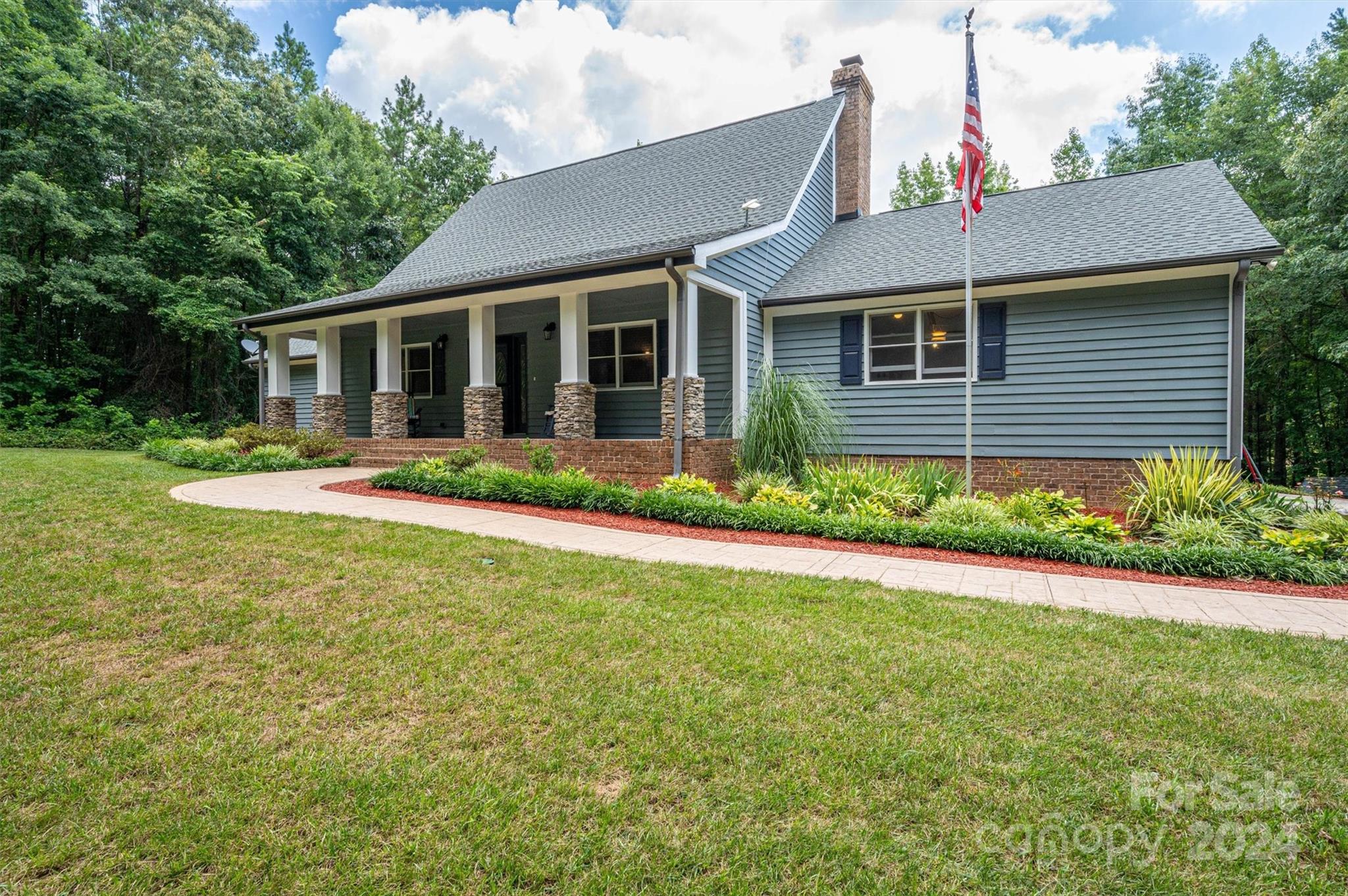 459 Patrick Road Gastonia, NC 28056 - Photo 6 of 39 a front view of house with yard and green space