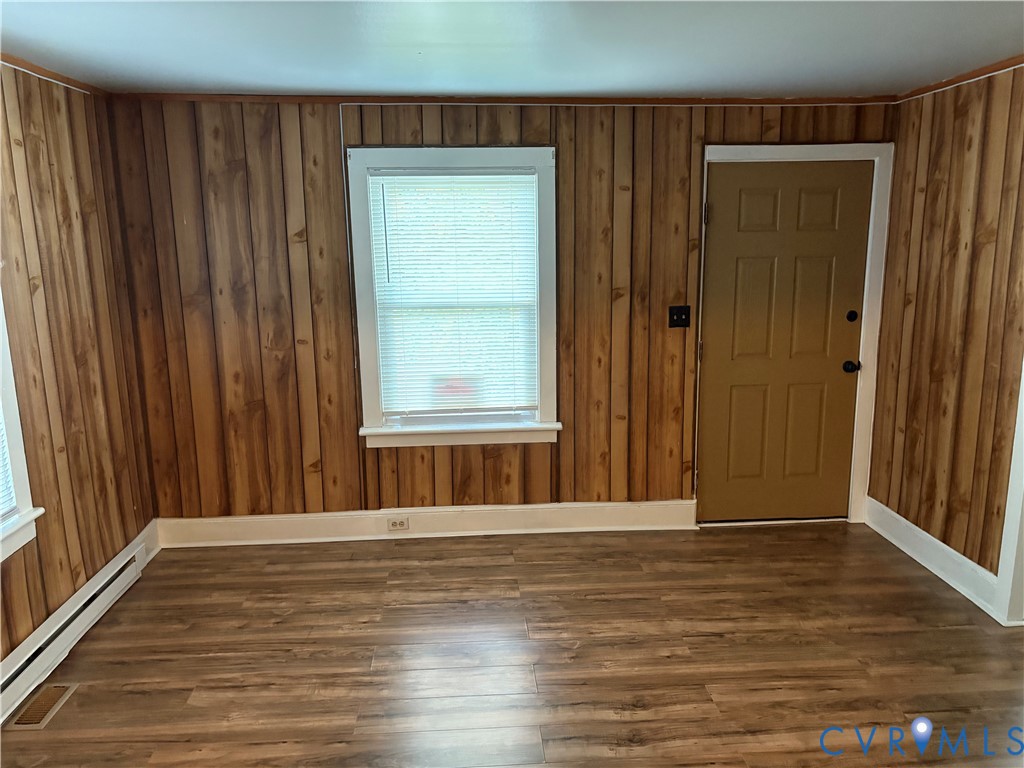 1904 Arlington Road Hopewell, VA 23860 - Photo 2 of 13 Foyer entrance featuring wooden walls, dark wood-s