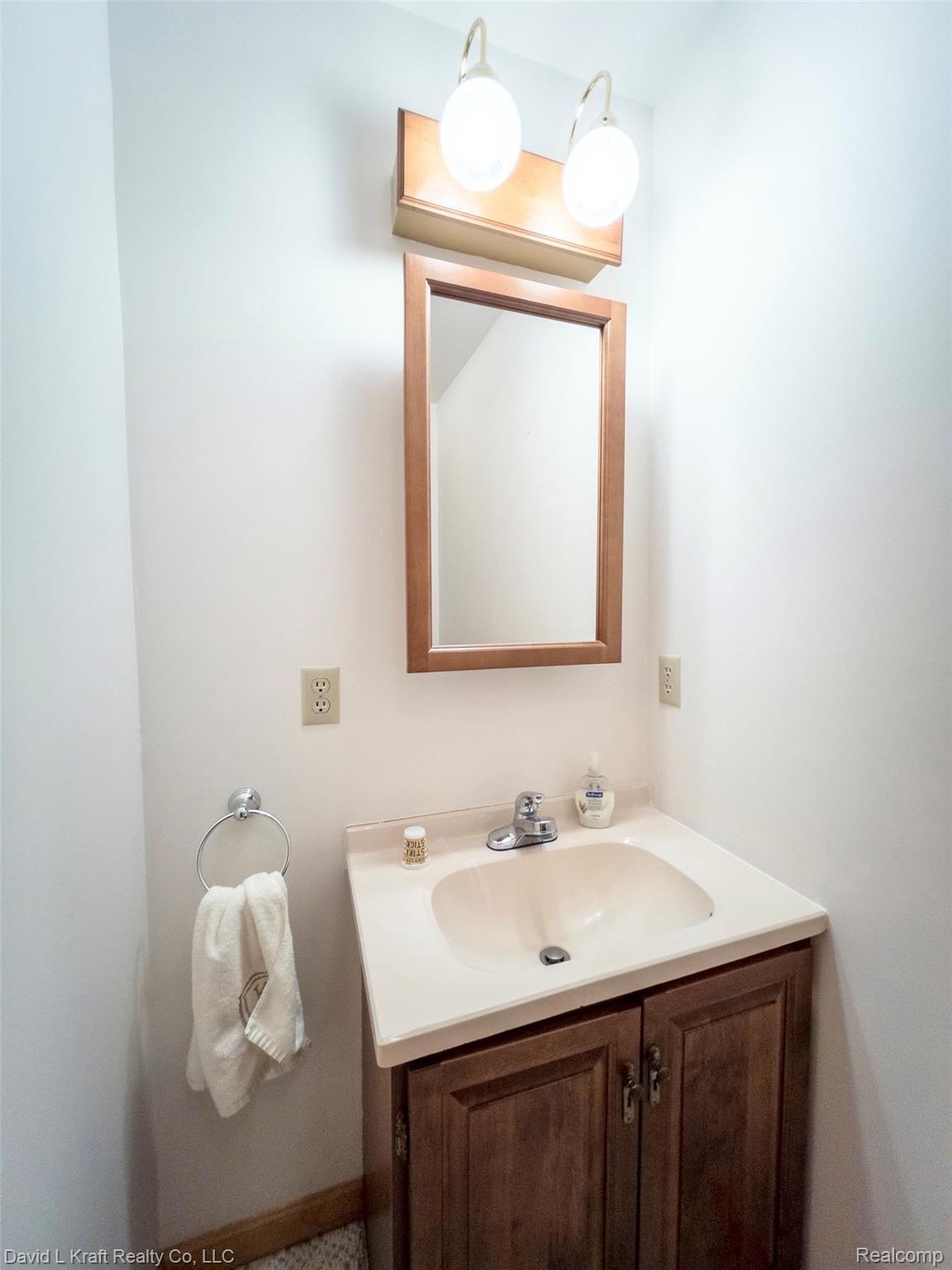 8524 Crescent Beach Road Pigeon, MI 48755 - Photo 20 of 41 8524CBHalfBathVanity.jpg