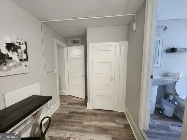 a view of a study room and bathroom