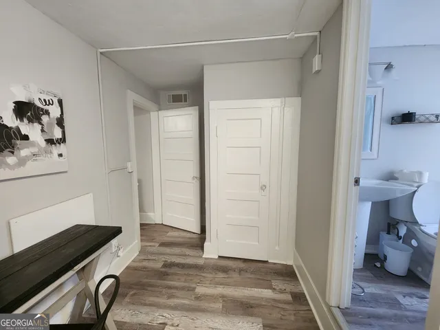 a view of a study room and bathroom