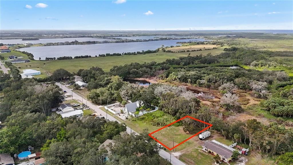 1115 Canal Street Ruskin, FL 33570 - Photo 3 of 5 an aerial view of ocean and residential houses with outdoor space